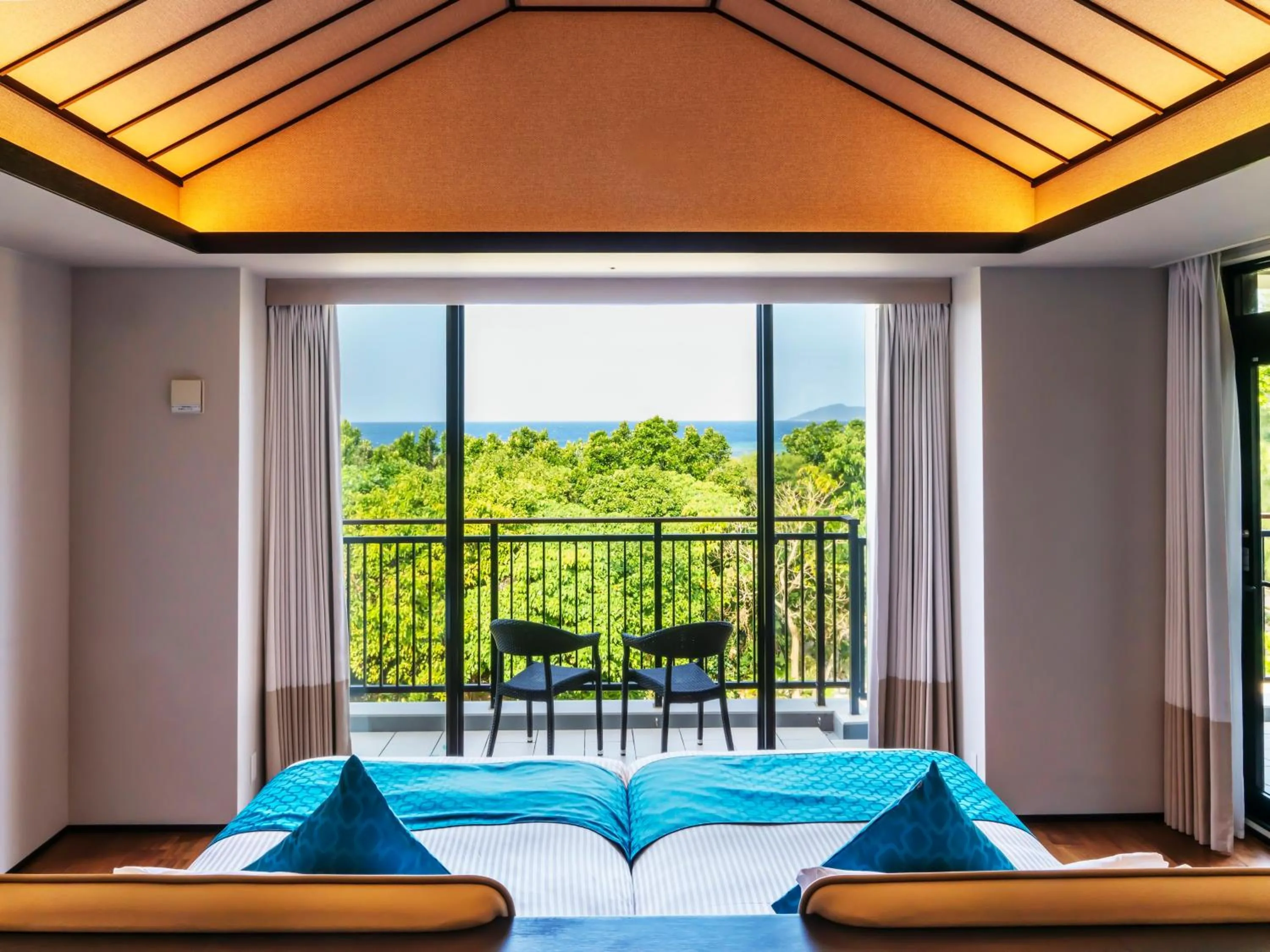 View (from property/room), Bed in FUSAKI BEACH RESORT HOTEL & VILLAS