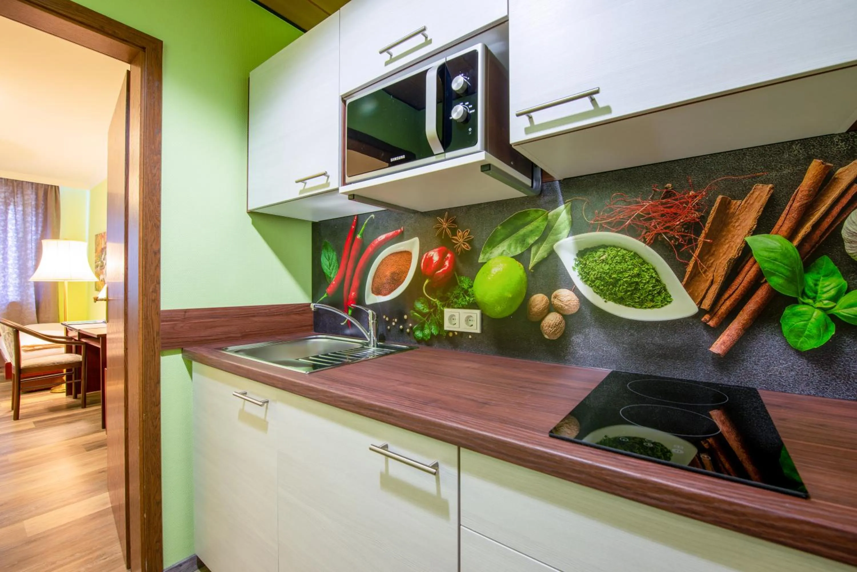 Kitchen or kitchenette in Appart-Hotel-Heldt