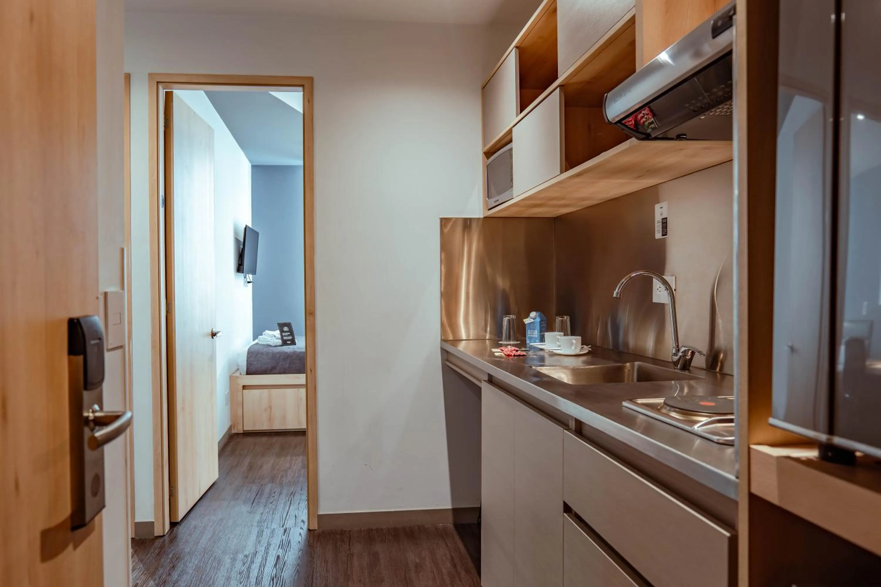 Kitchen or kitchenette in UMA Suites Chia