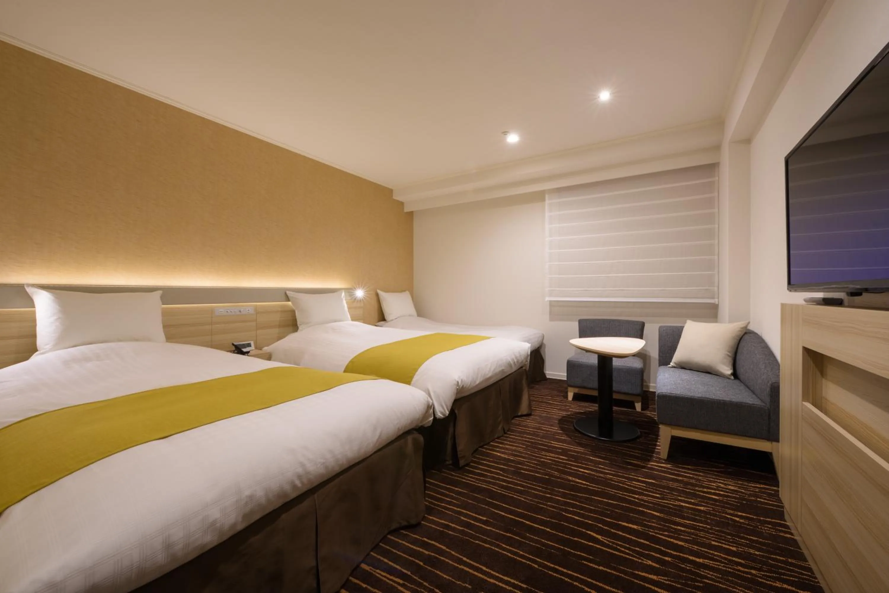 Bed in Hotel JAL City Sendai