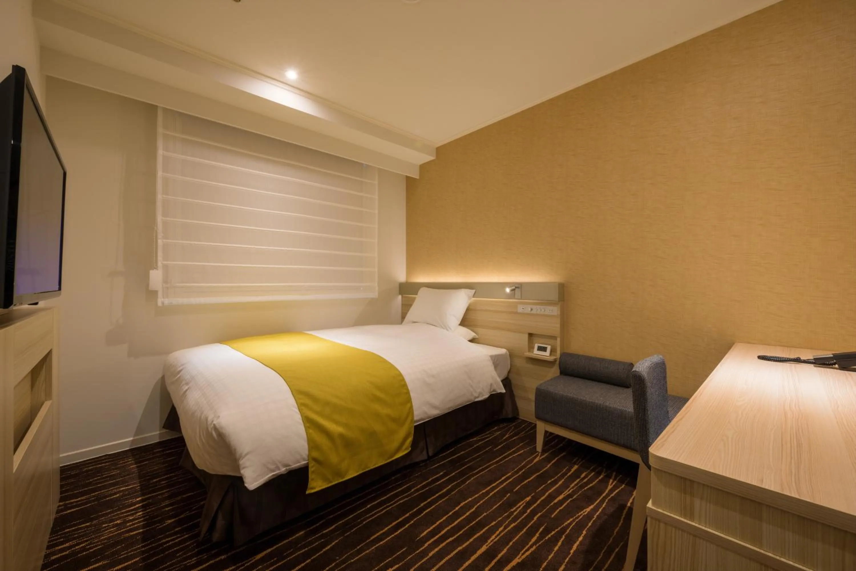 Bed in Hotel JAL City Sendai