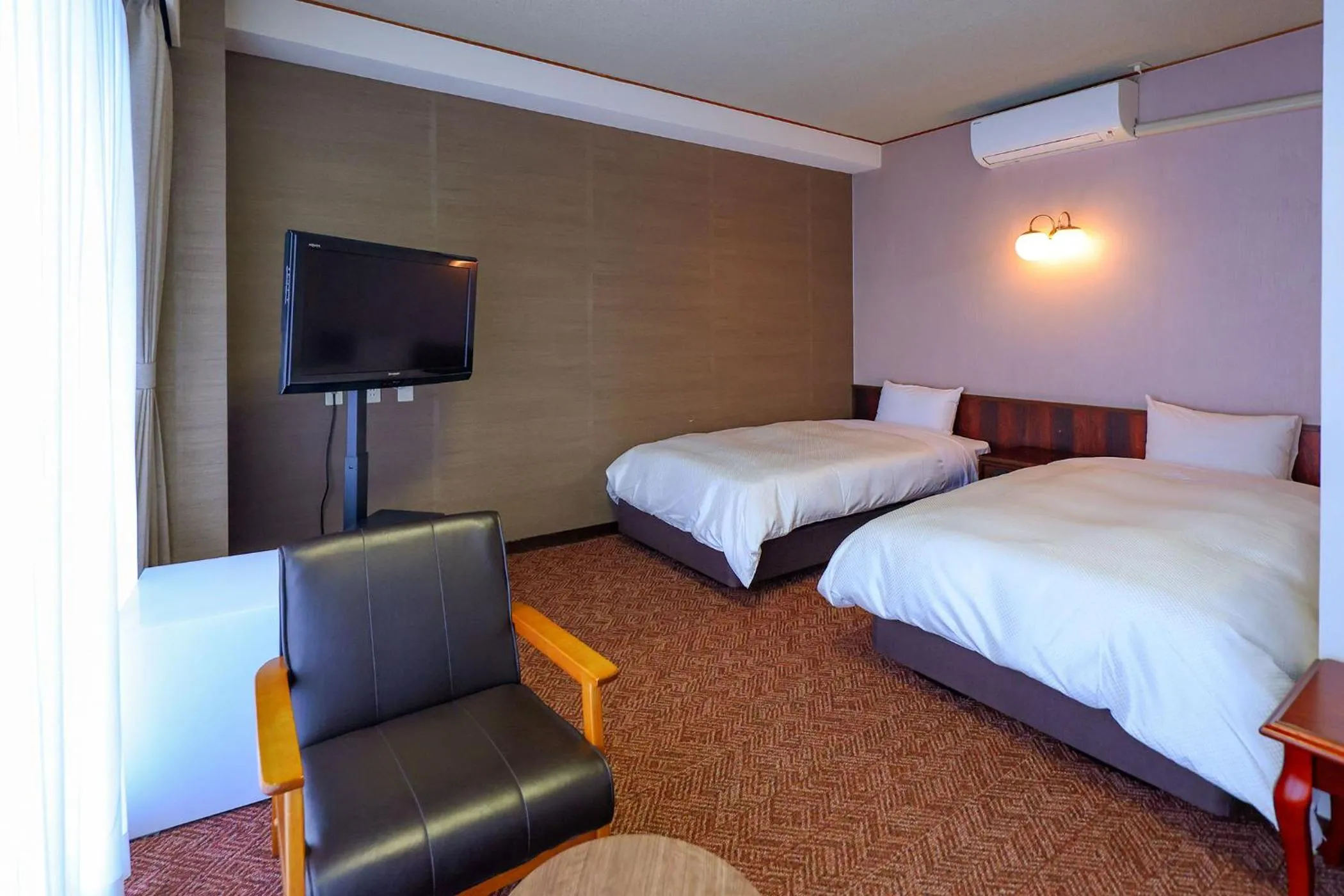 Bed in Ooedo Onsen Monogatari Premium Kinugawa Kanko Hotel