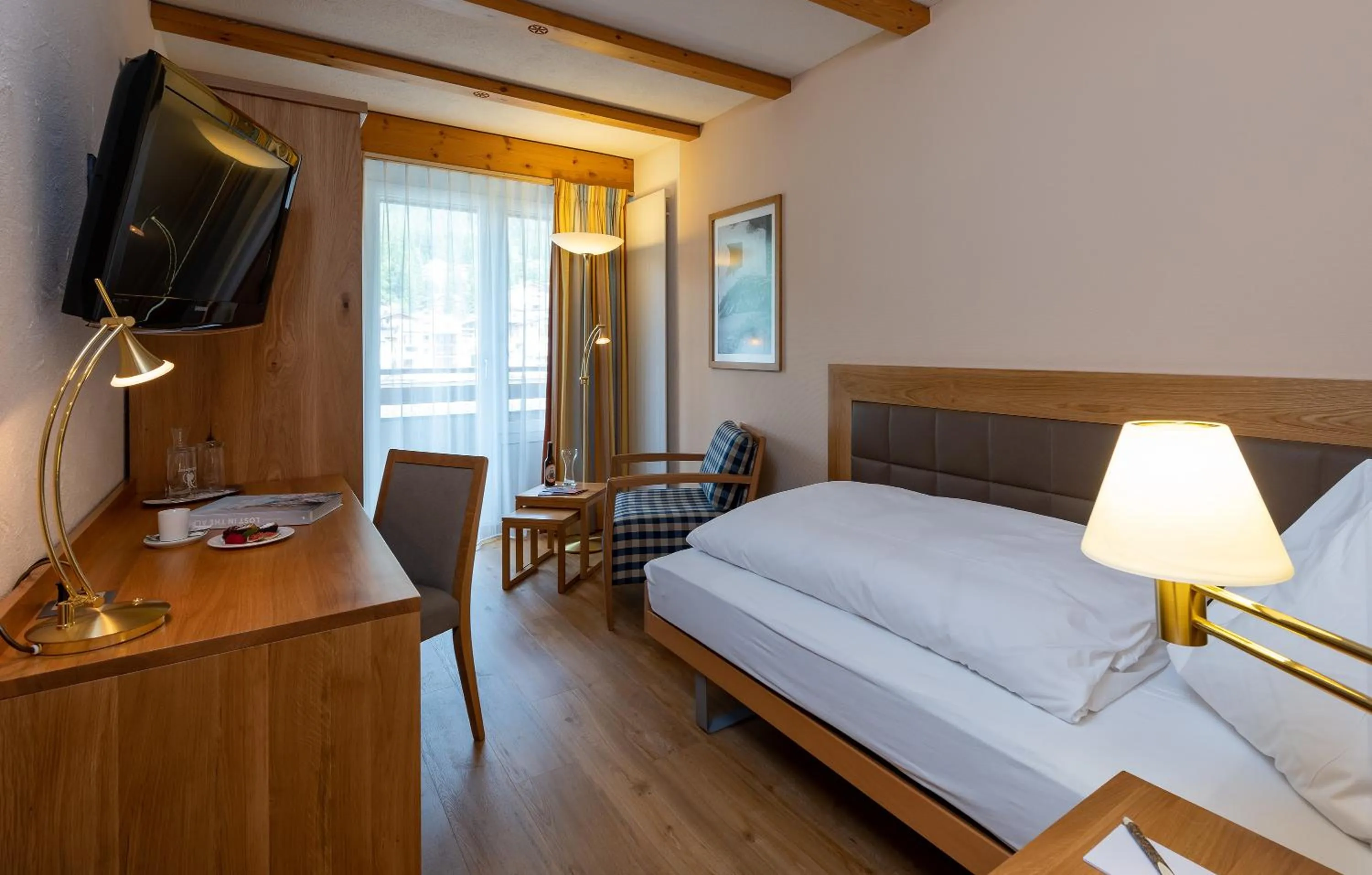 Bed in Sunstar Hotel Lenzerheide