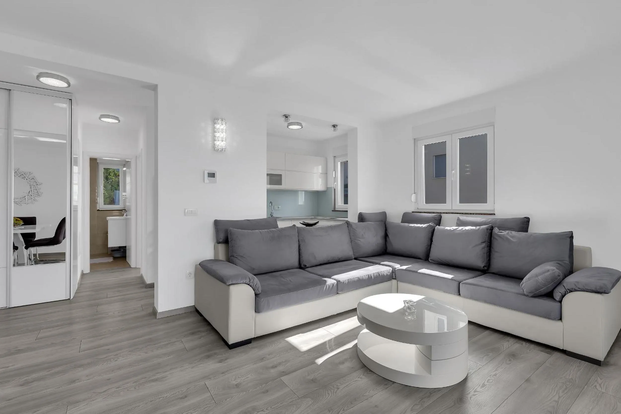 Communal lounge/ TV room in Sea View Apartments Dammi with free parking