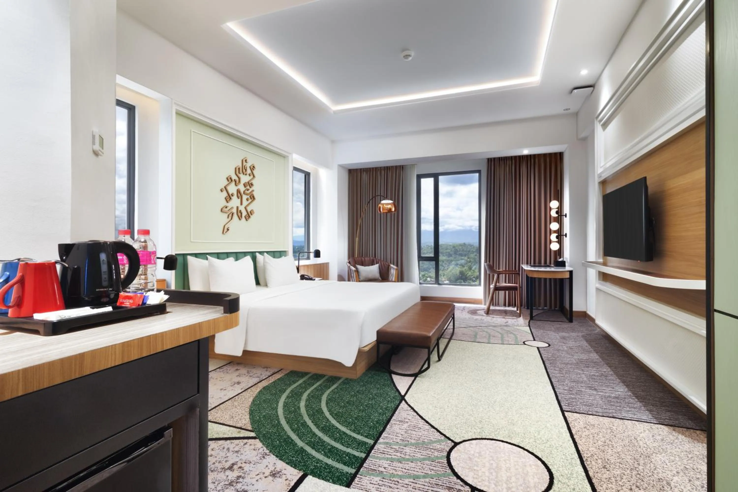 Bed in Luwansa Hotel and Convention Center Manado