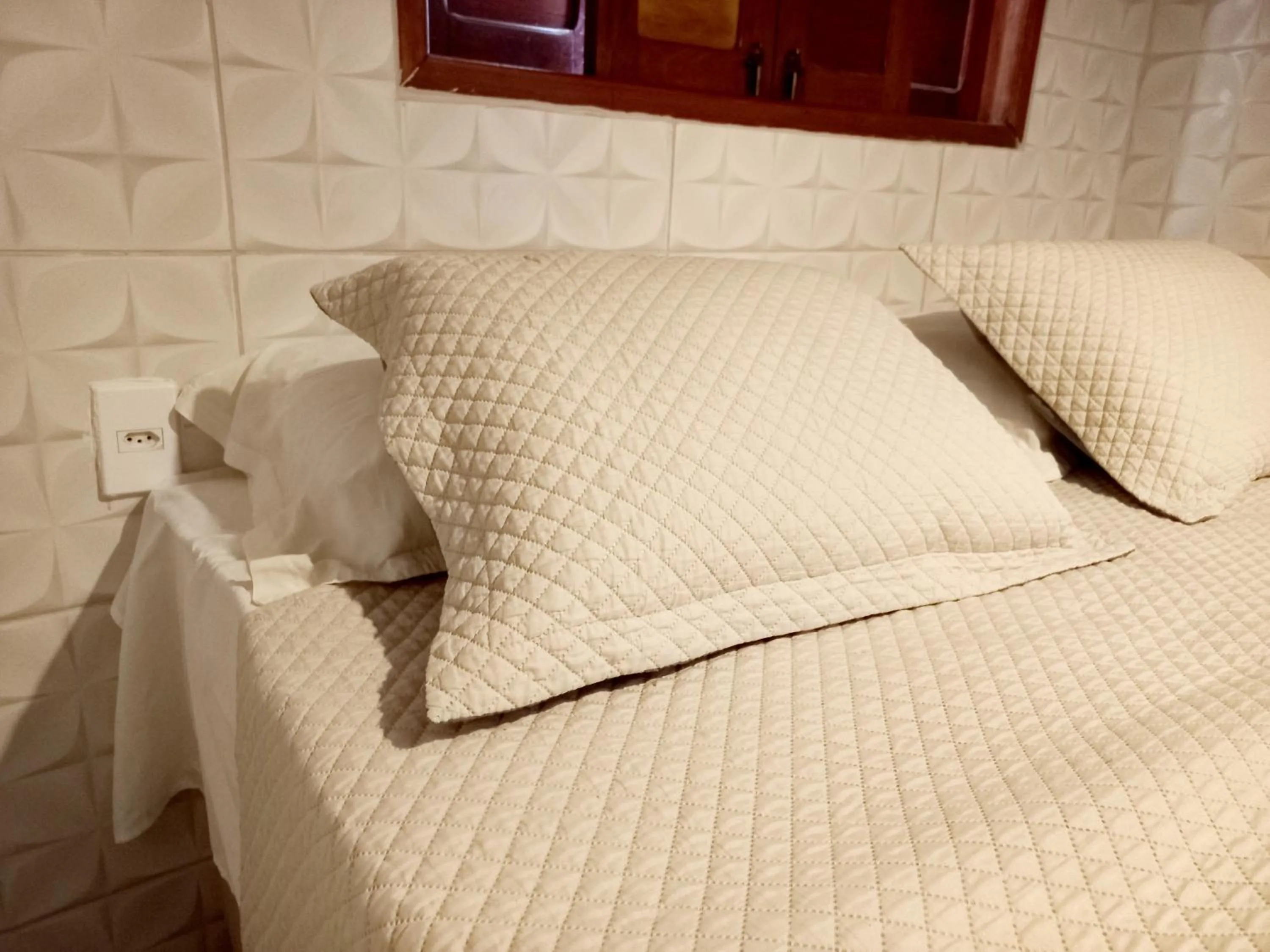 Bed in Chalé Palhano Beach