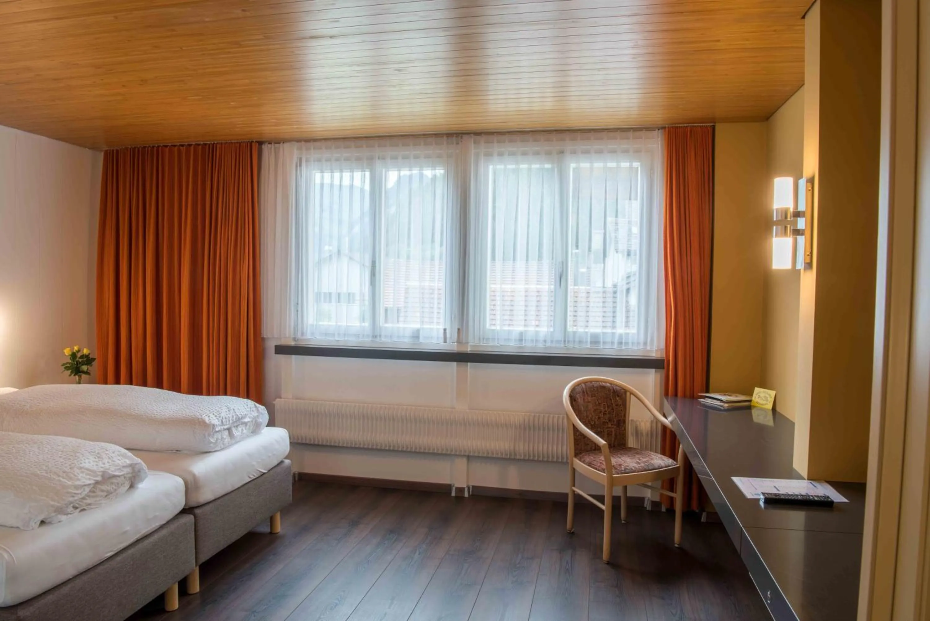 Photo of the whole room, Bed in Hotel Garni Rösslipost