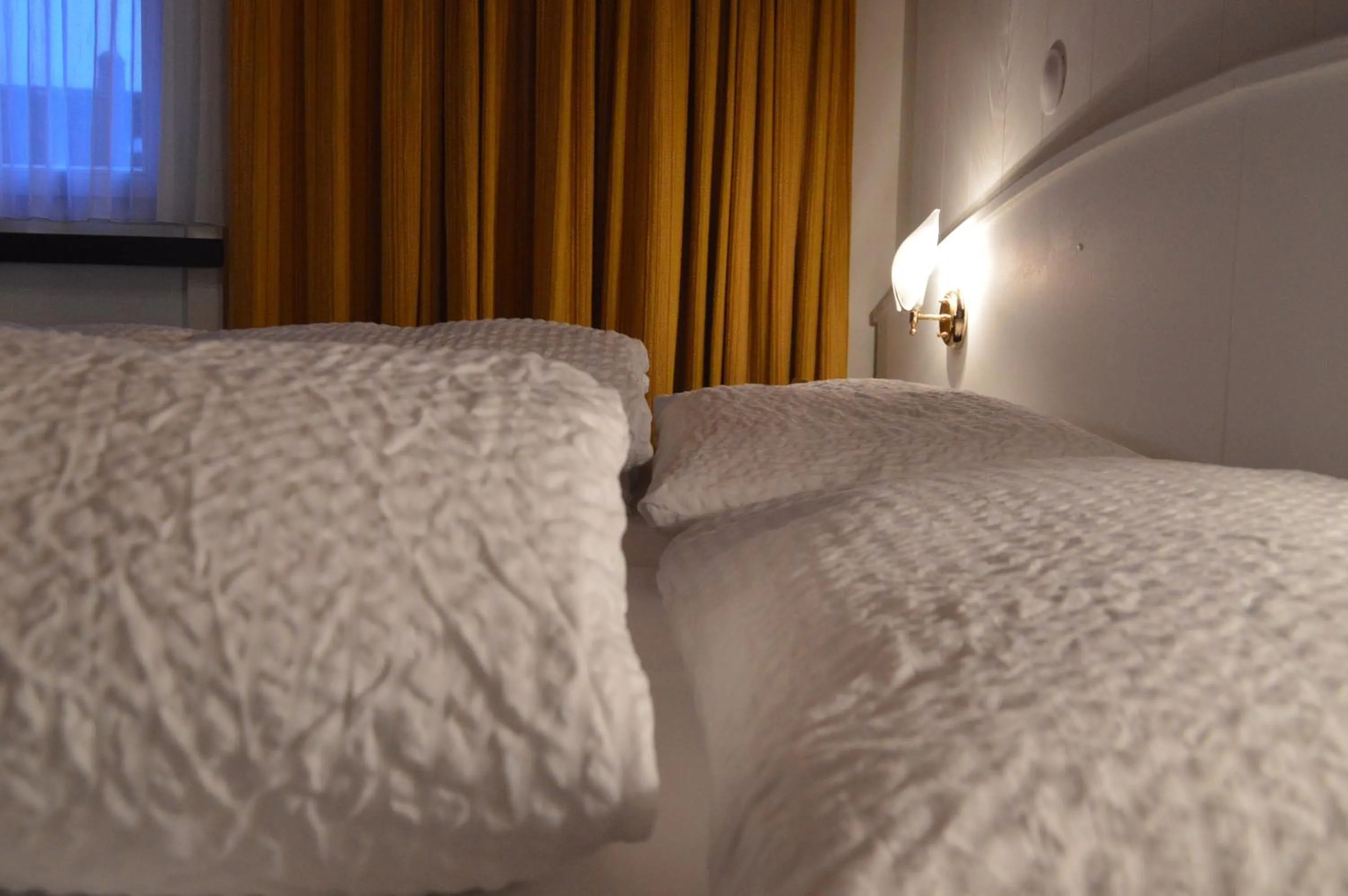 Bed in Hotel Garni Rösslipost