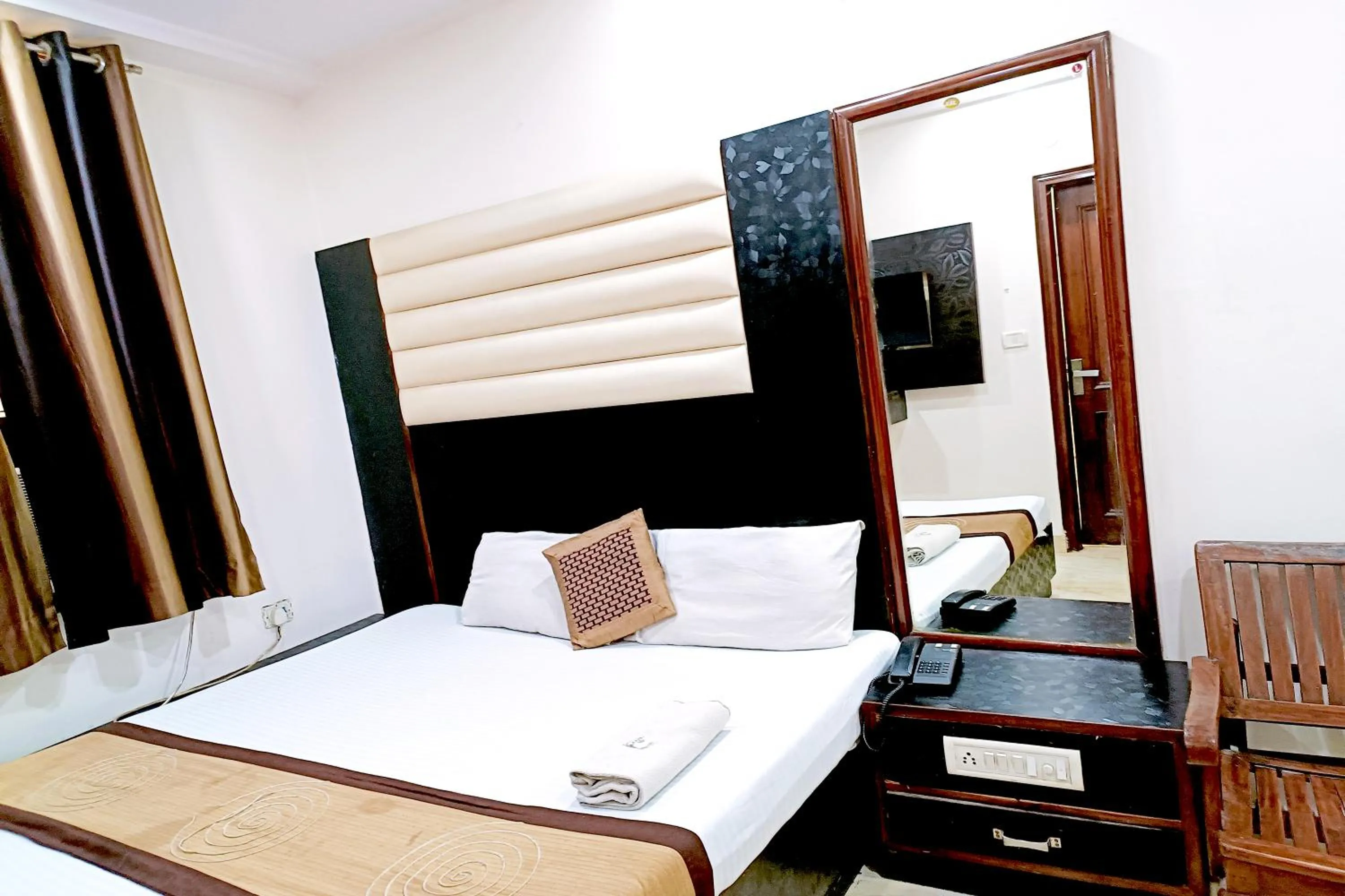 Bedroom, Bed in Hotel Crystal Deluxe at New Delhi Railway Station