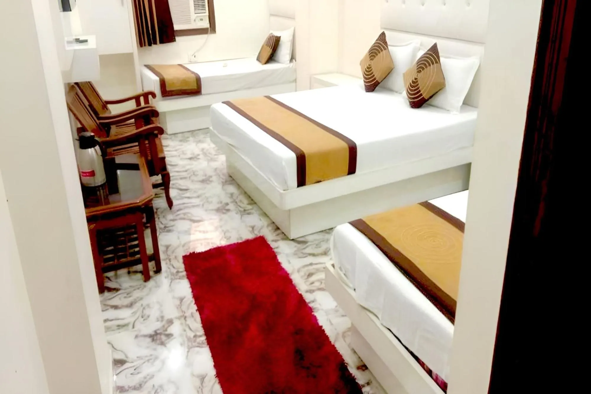 Bed in Hotel Crystal Deluxe at New Delhi Railway Station