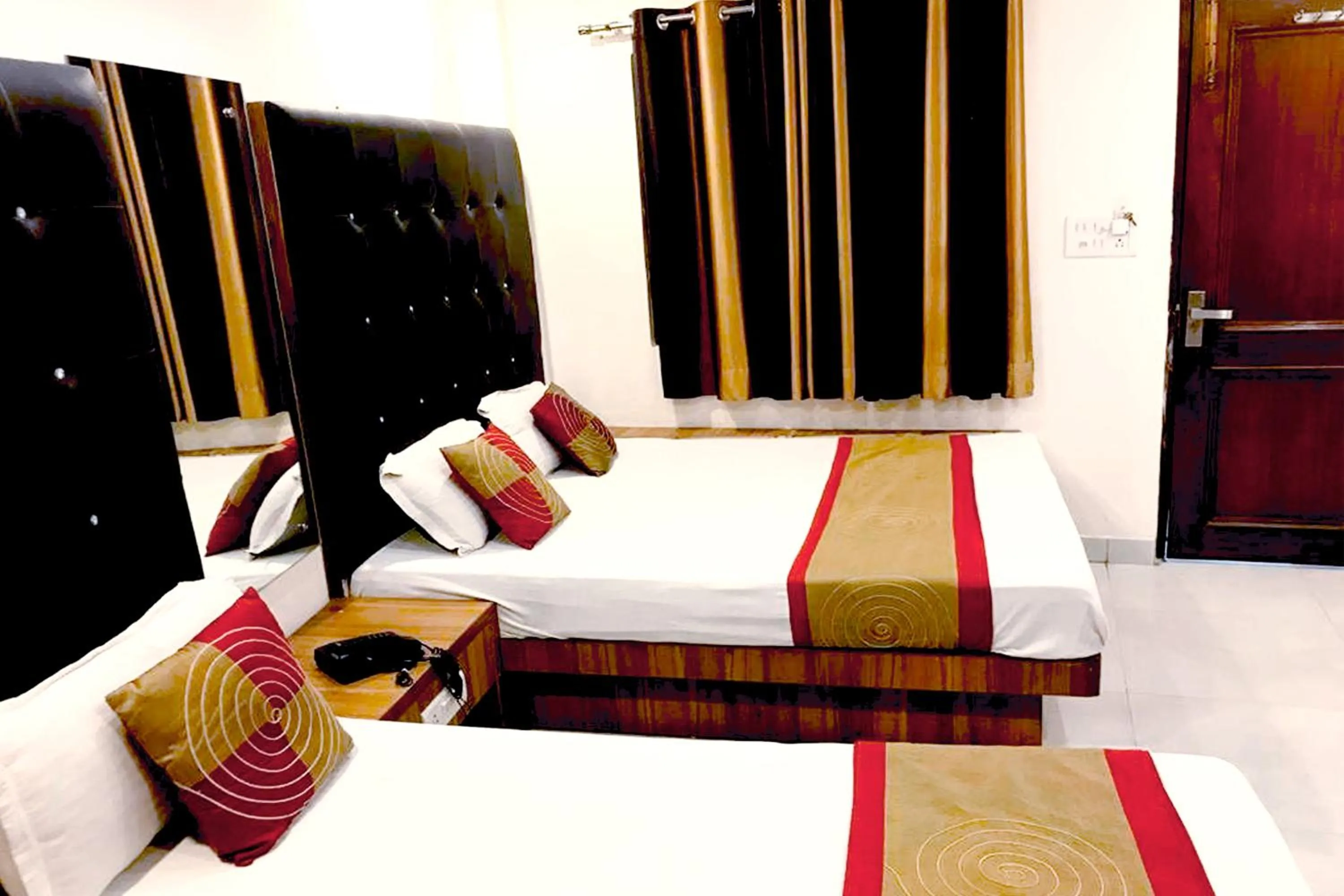 Bedroom, Bed in Hotel Crystal Deluxe at New Delhi Railway Station
