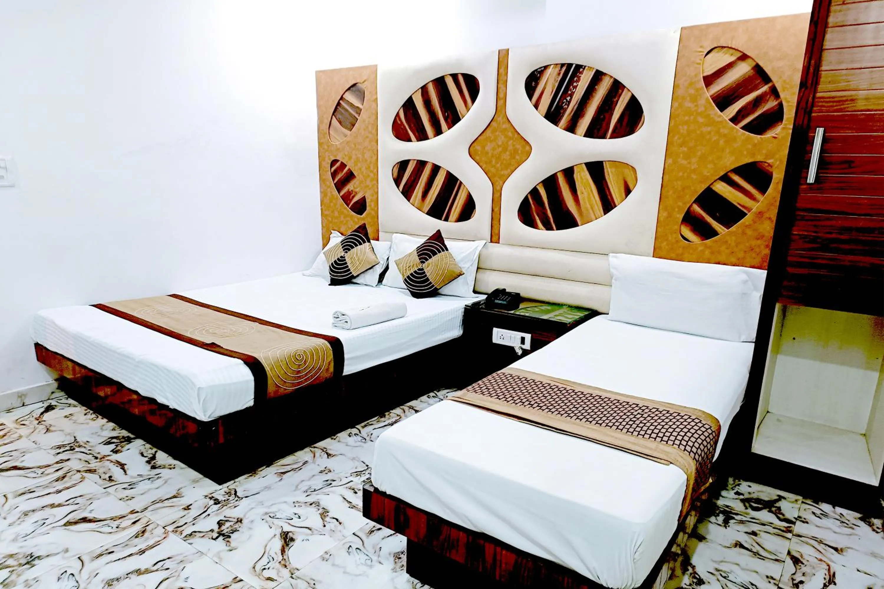 Bedroom, Bed in Hotel Crystal Deluxe at New Delhi Railway Station
