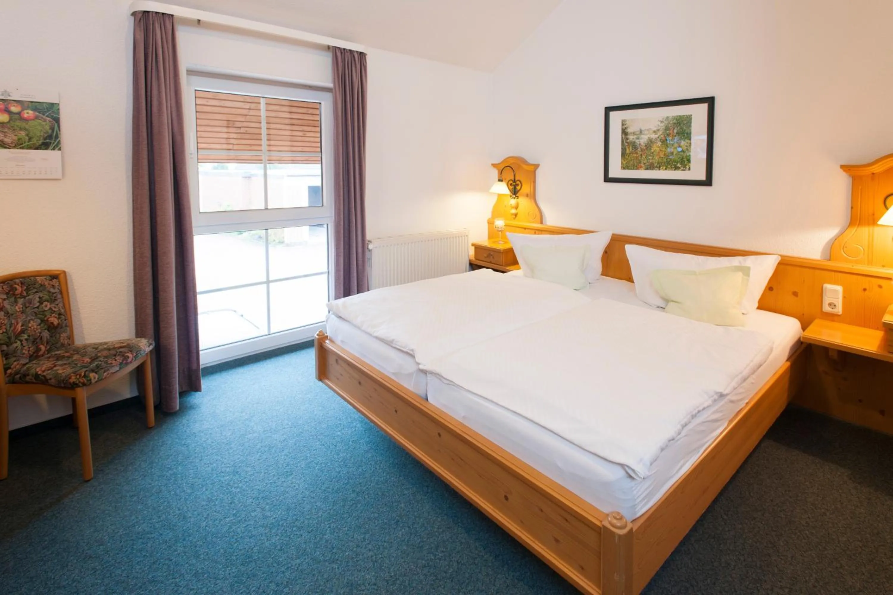 Photo of the whole room, Bed in Landhotel Behre