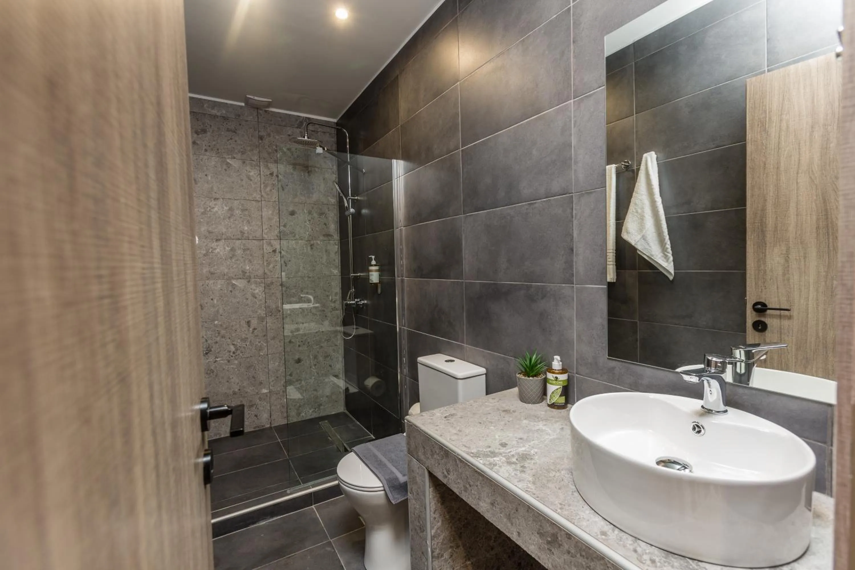 Bathroom in Raise Athens Metro Apartments