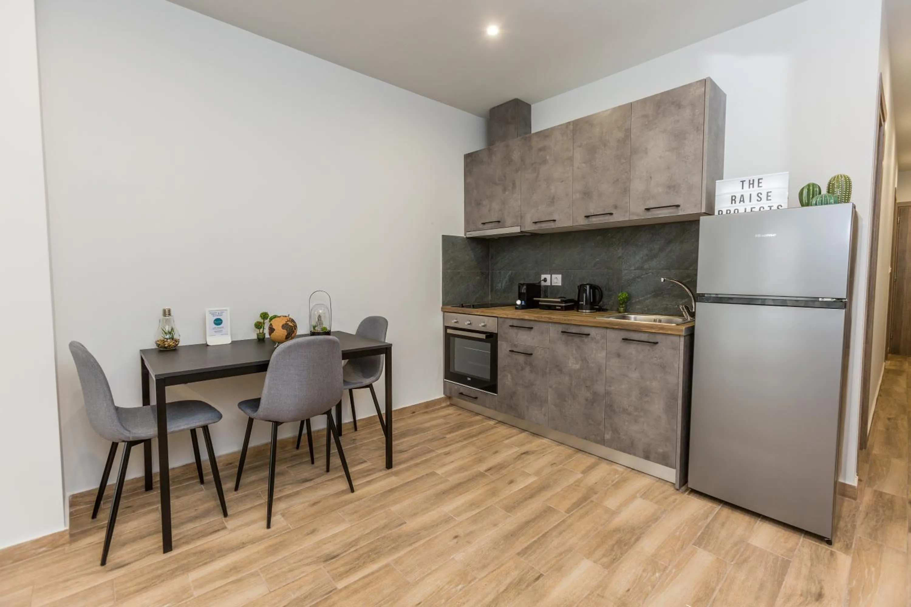 Kitchen or kitchenette in Raise Athens Metro Apartments