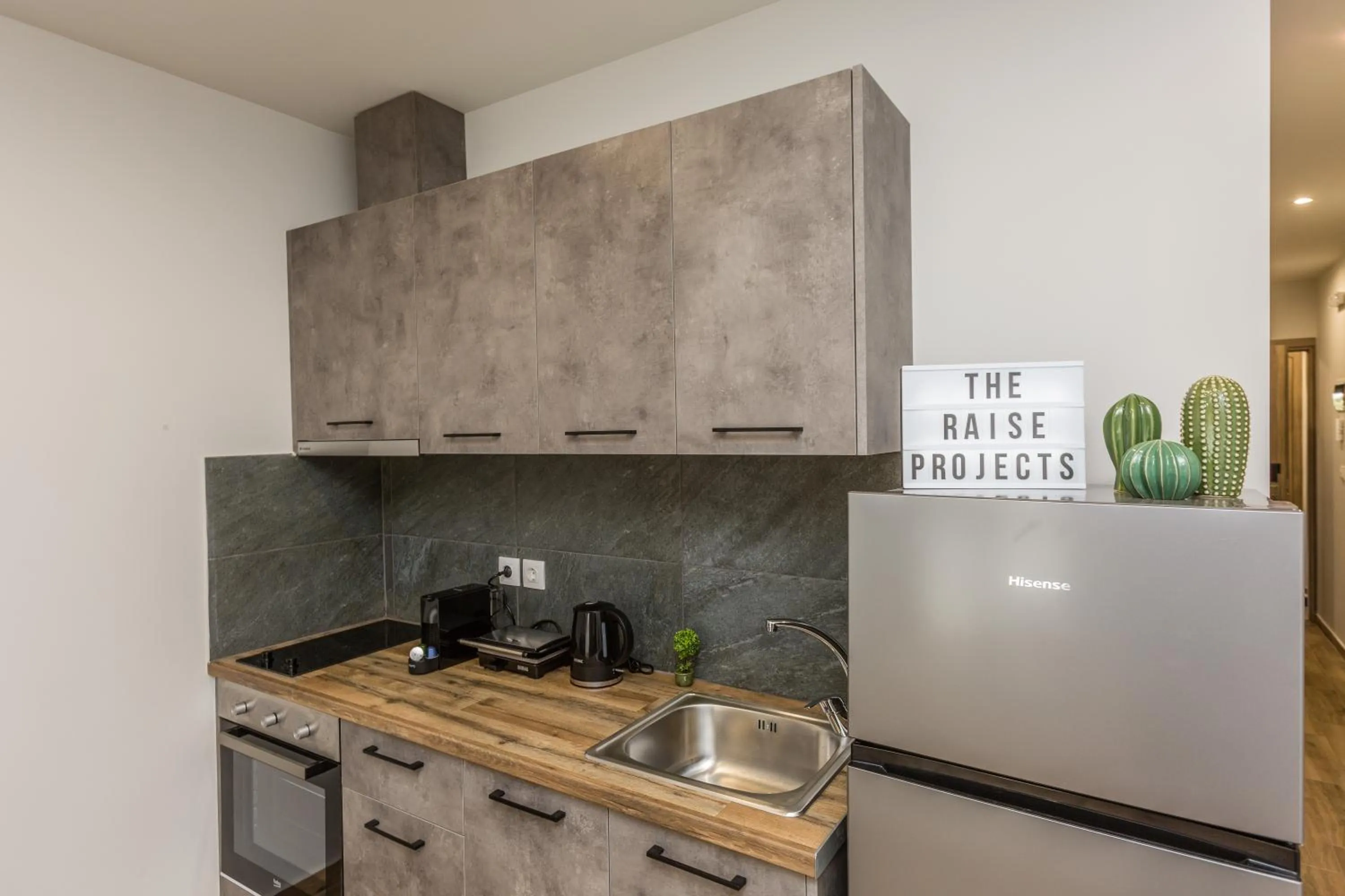 Kitchen or kitchenette in Raise Athens Metro Apartments