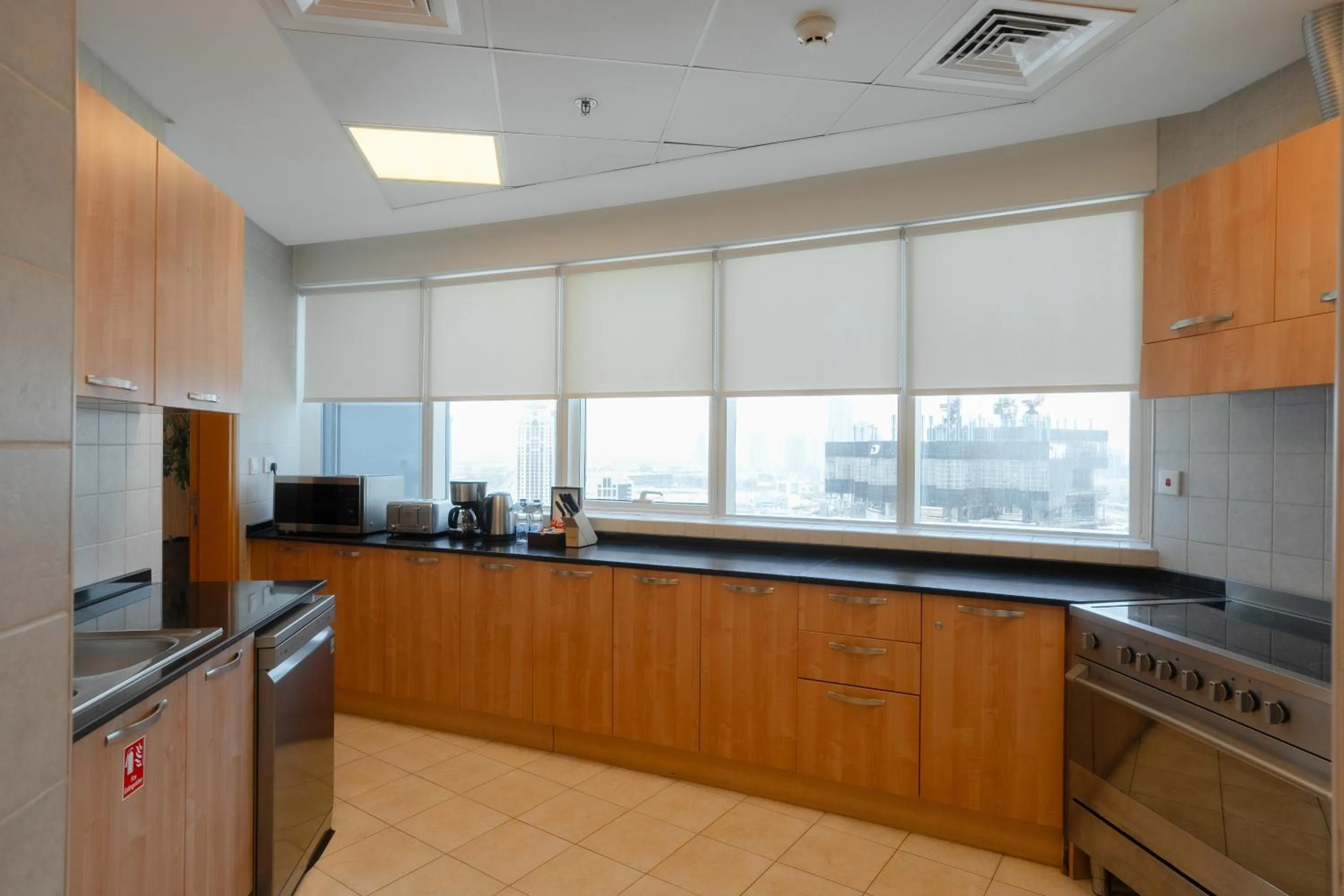 Kitchen or kitchenette in Tamani Marina Hotel & Apartments