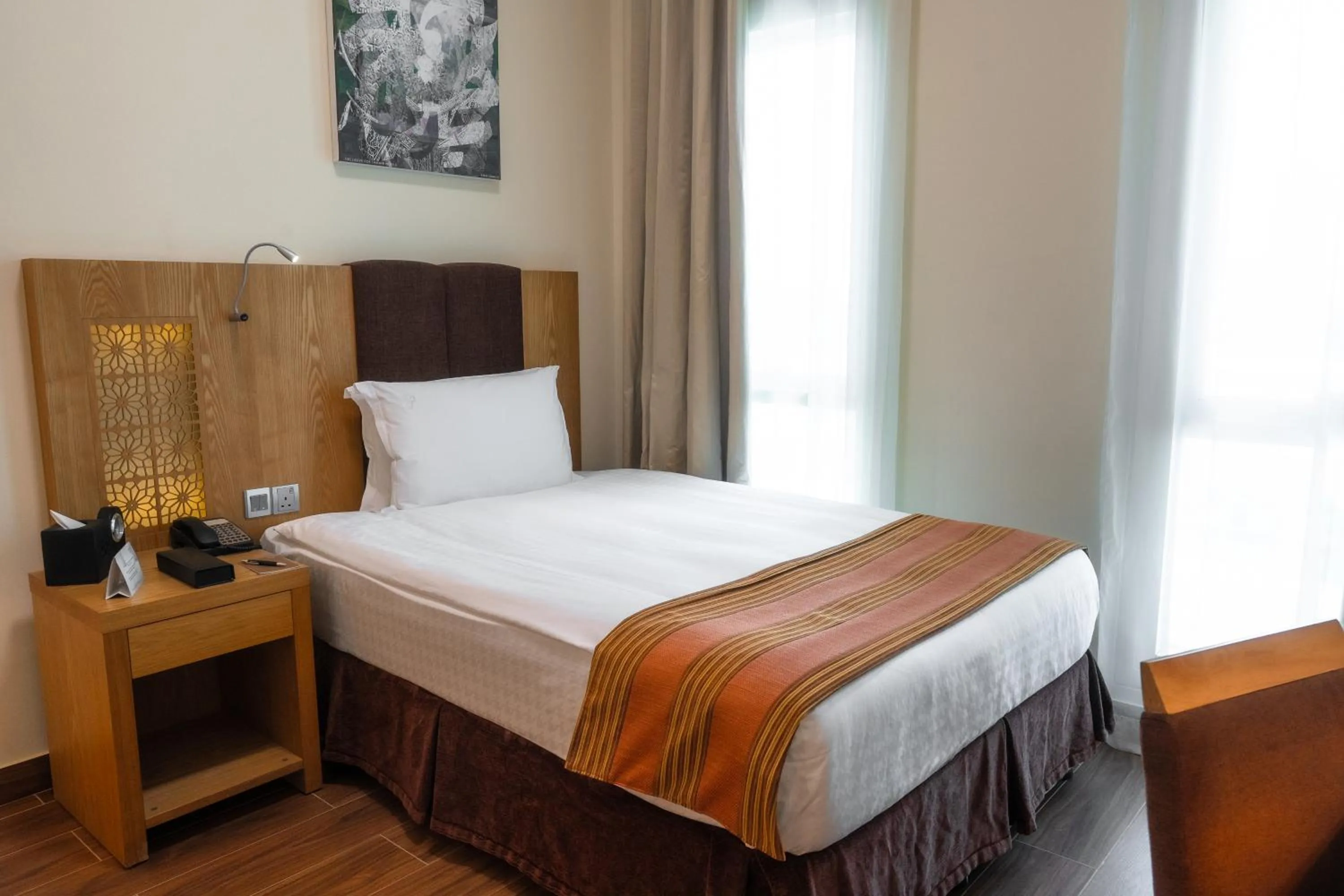 Bed in Tamani Marina Hotel & Apartments