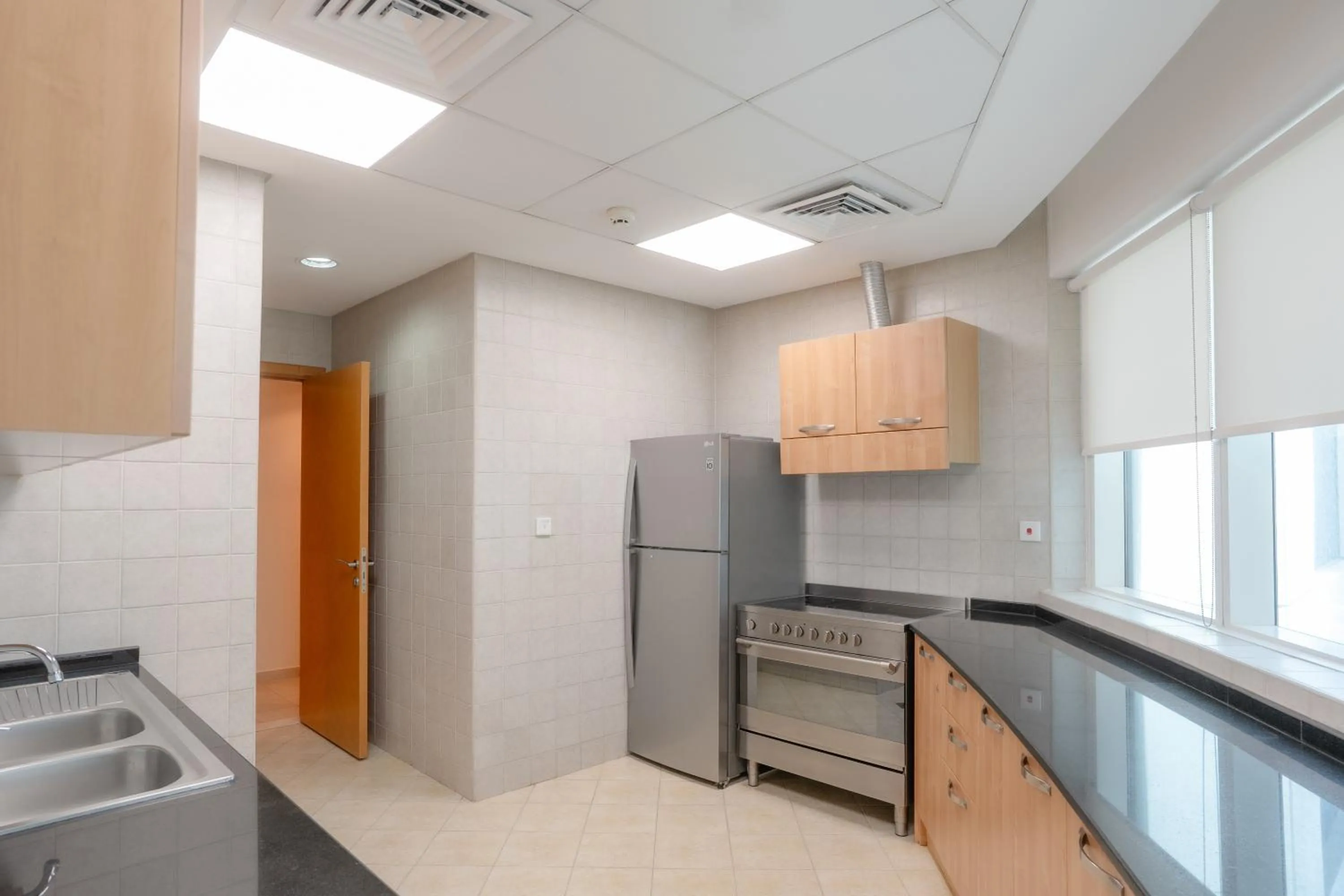 Kitchen or kitchenette in Tamani Marina Hotel & Apartments