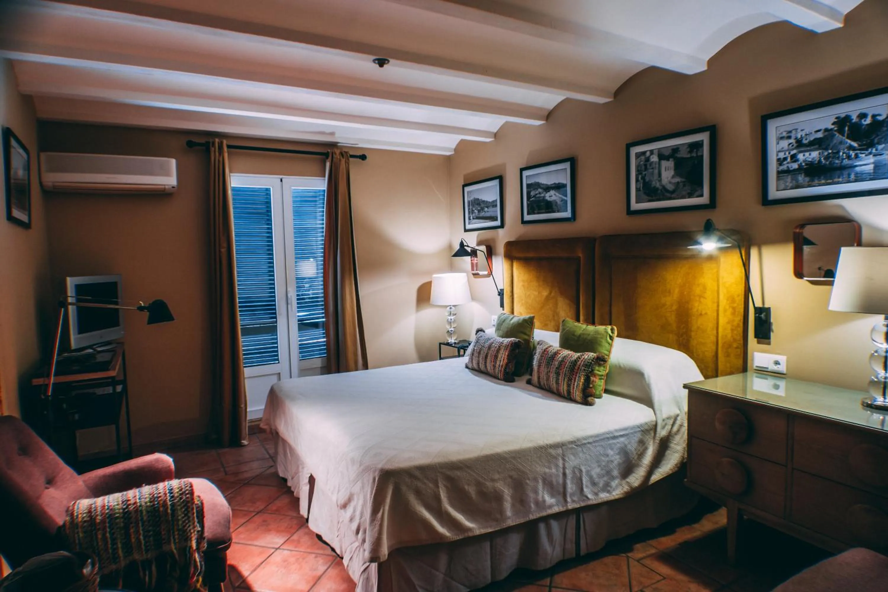 Bed in Hotel Carabeo