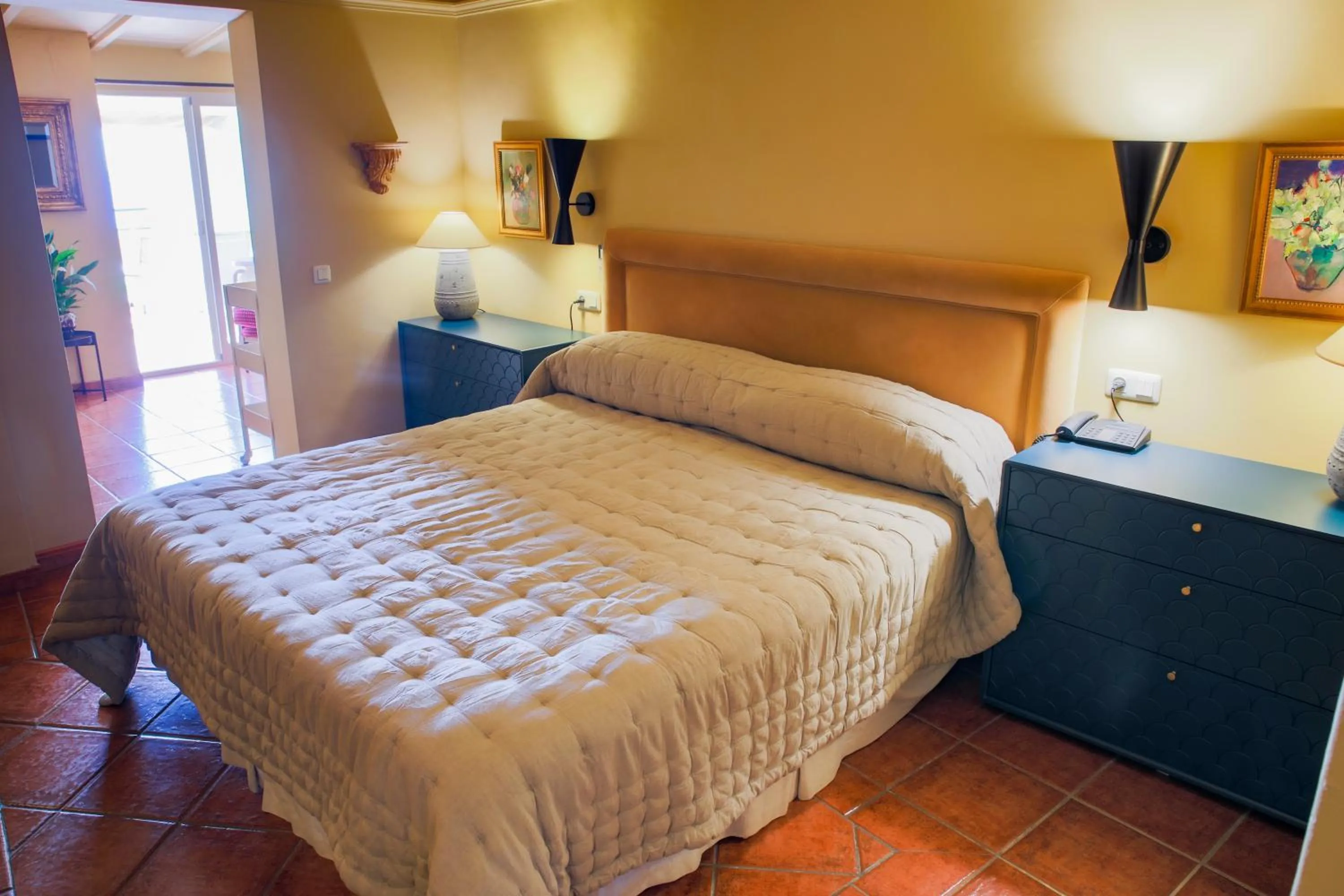 Bed in Hotel Carabeo