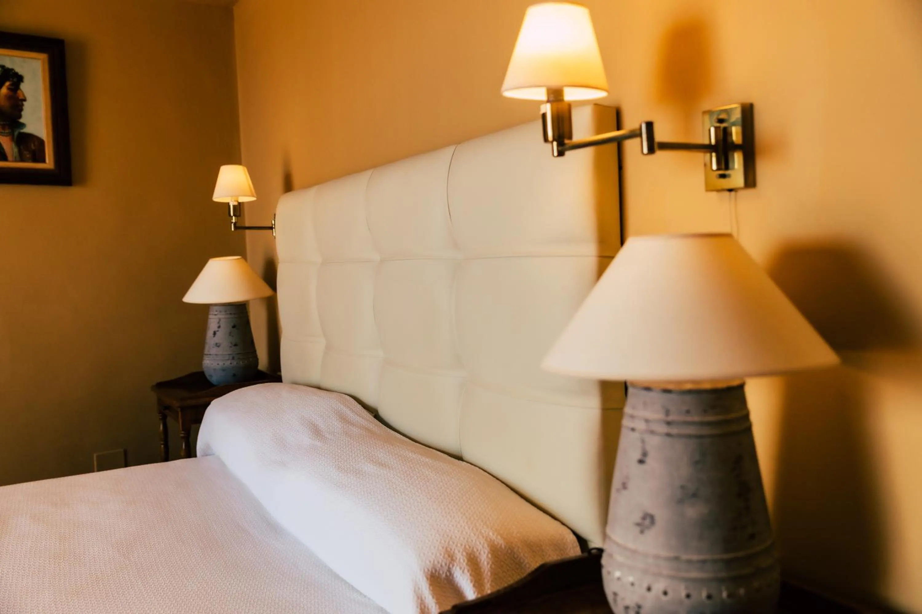 Bed in Hotel Carabeo