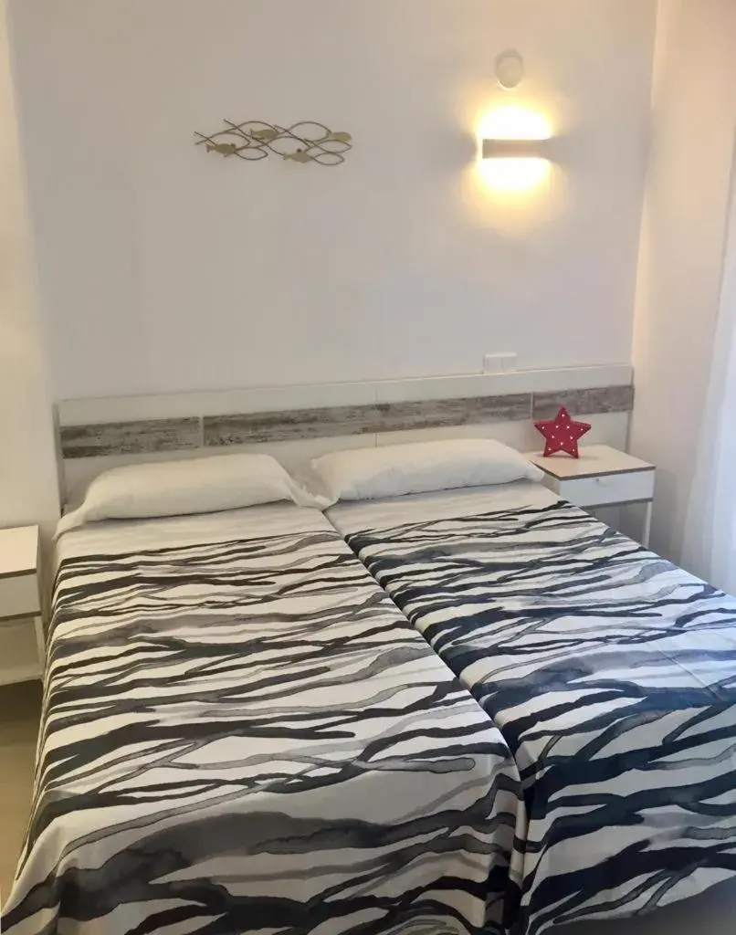 Bed in Apal Chinasol Estudios Bed in Apal Chinasol Estudios