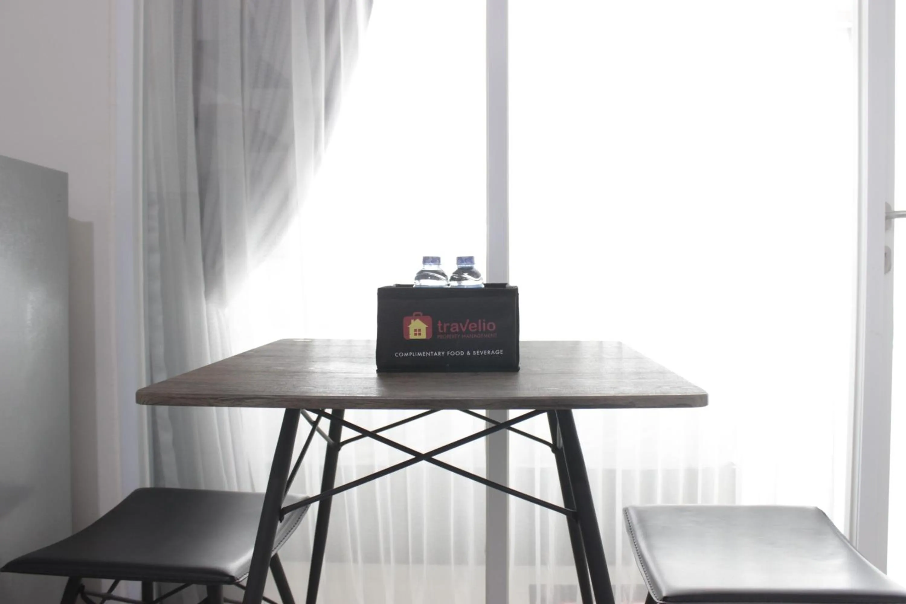 Dining area in Artistic 1BR Apartment at Gateway Pasteur near Exit Toll Pasteur By Travelio