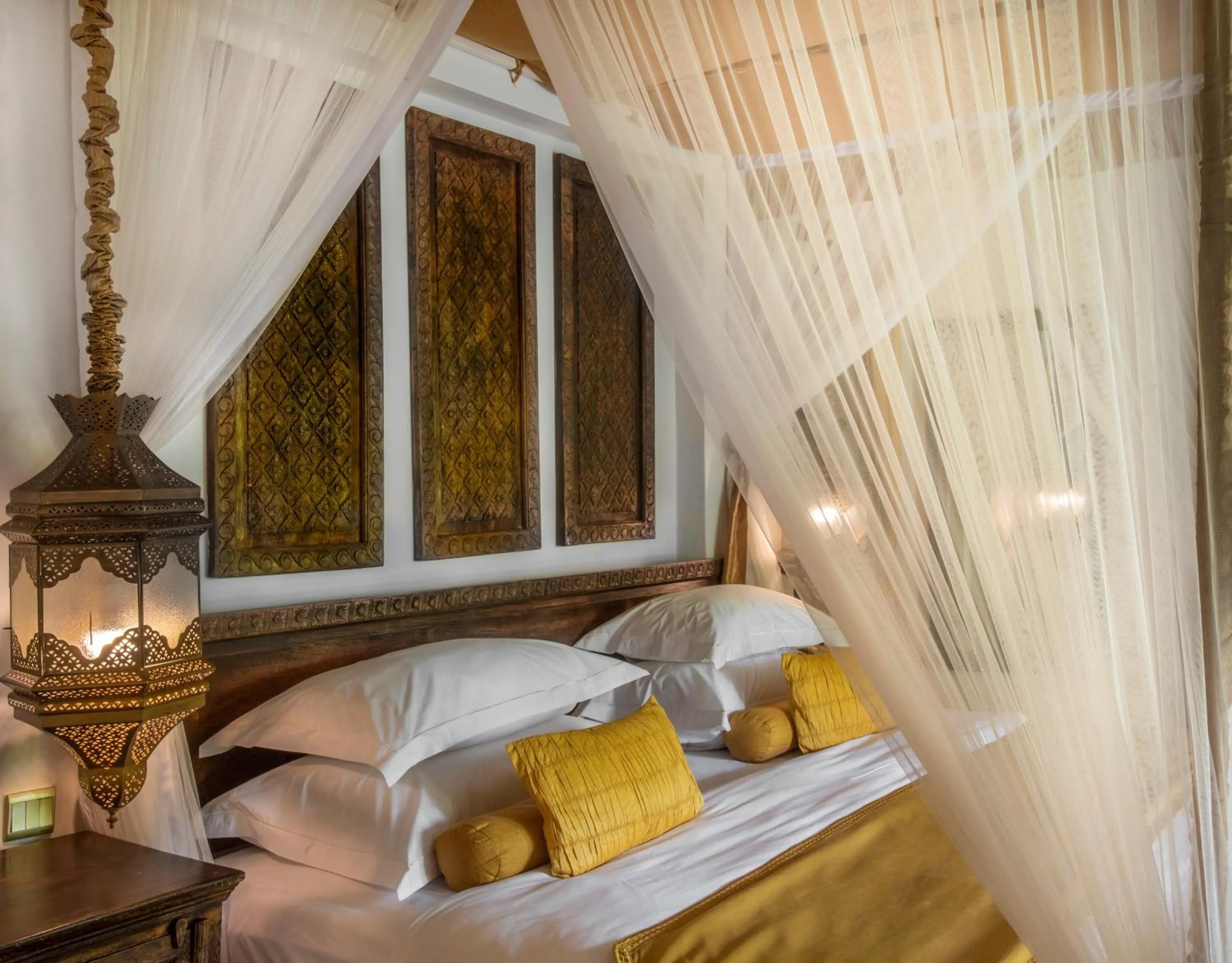 Bed in Baraza Resort and Spa Zanzibar