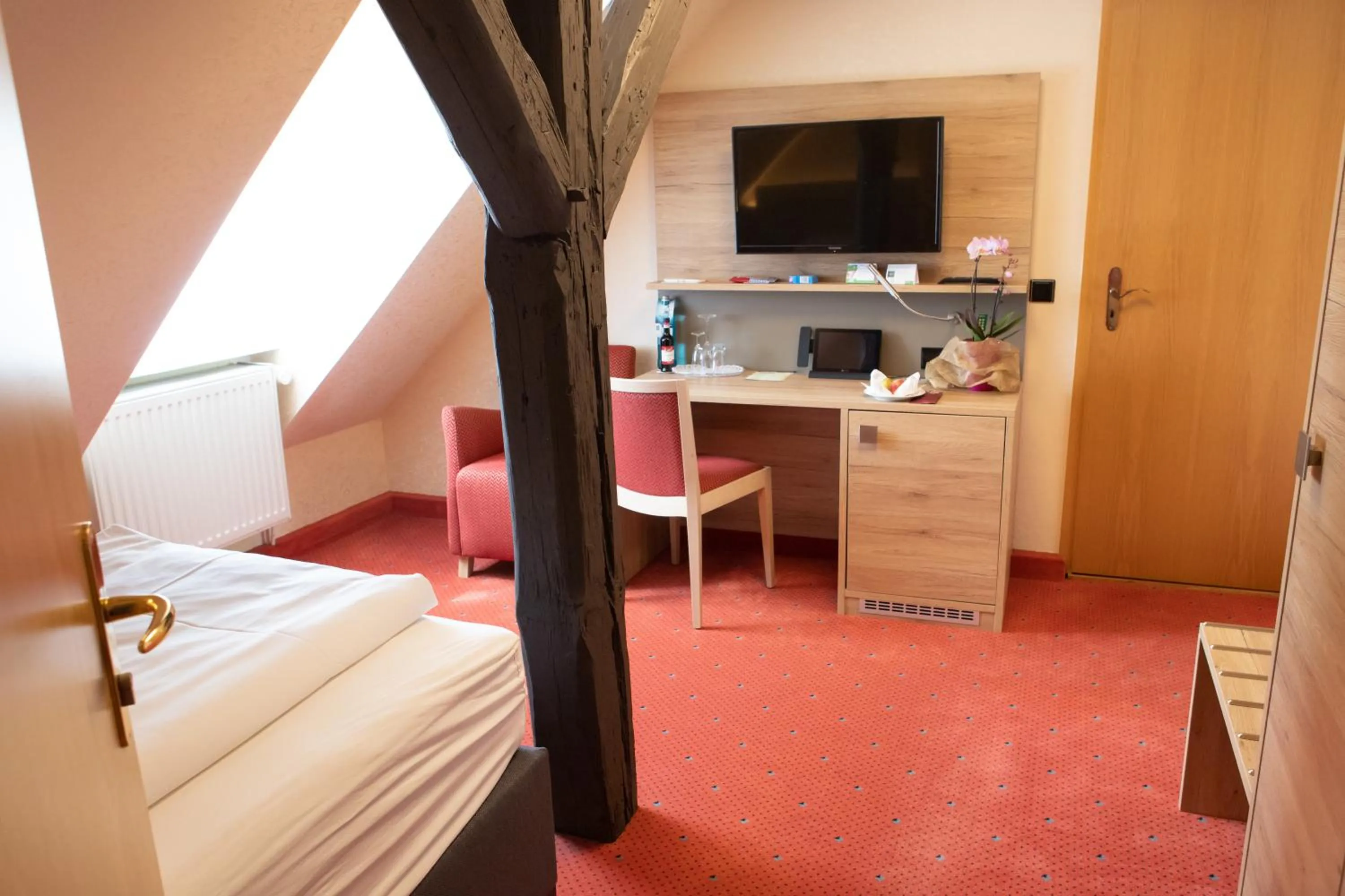 Bed in Flair Hotel Deutsches Haus