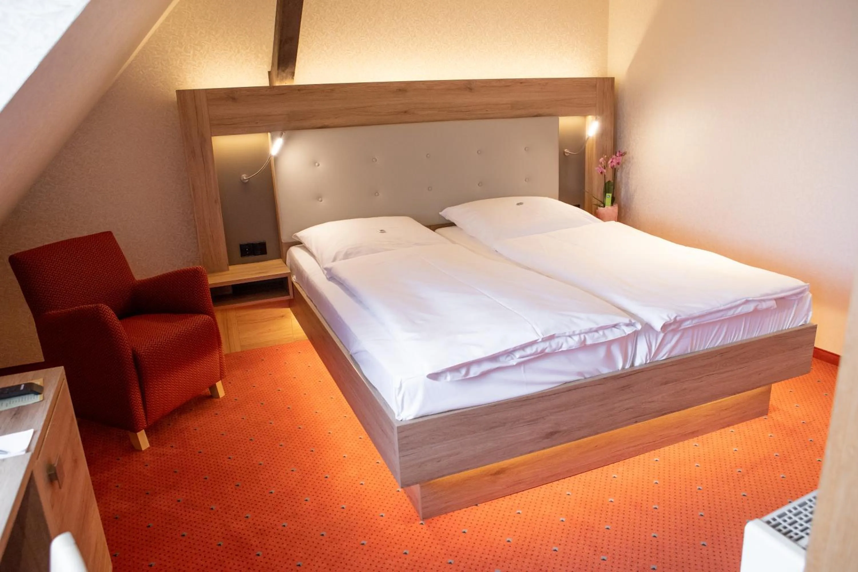 Bed in Flair Hotel Deutsches Haus