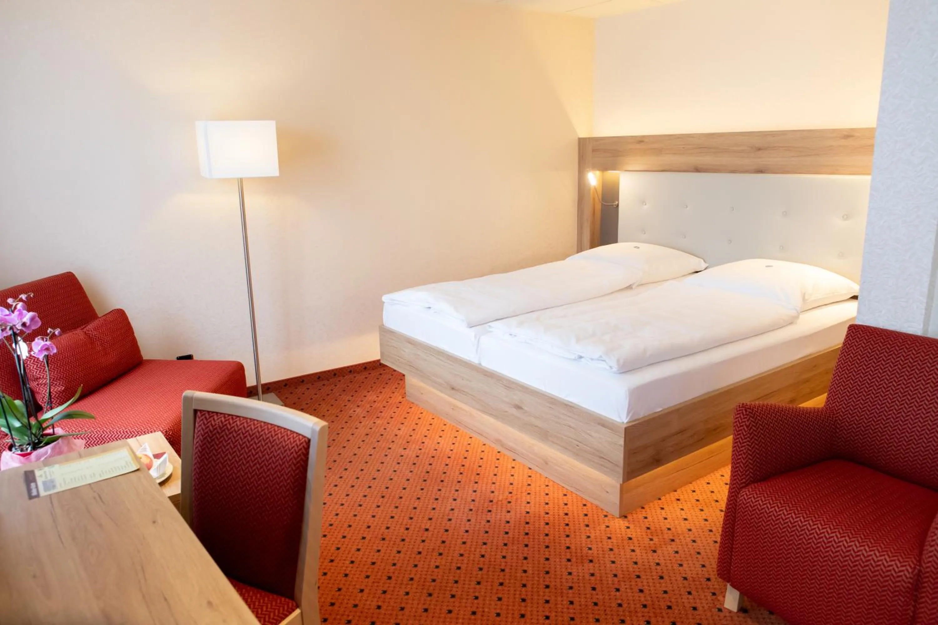 Bed in Flair Hotel Deutsches Haus