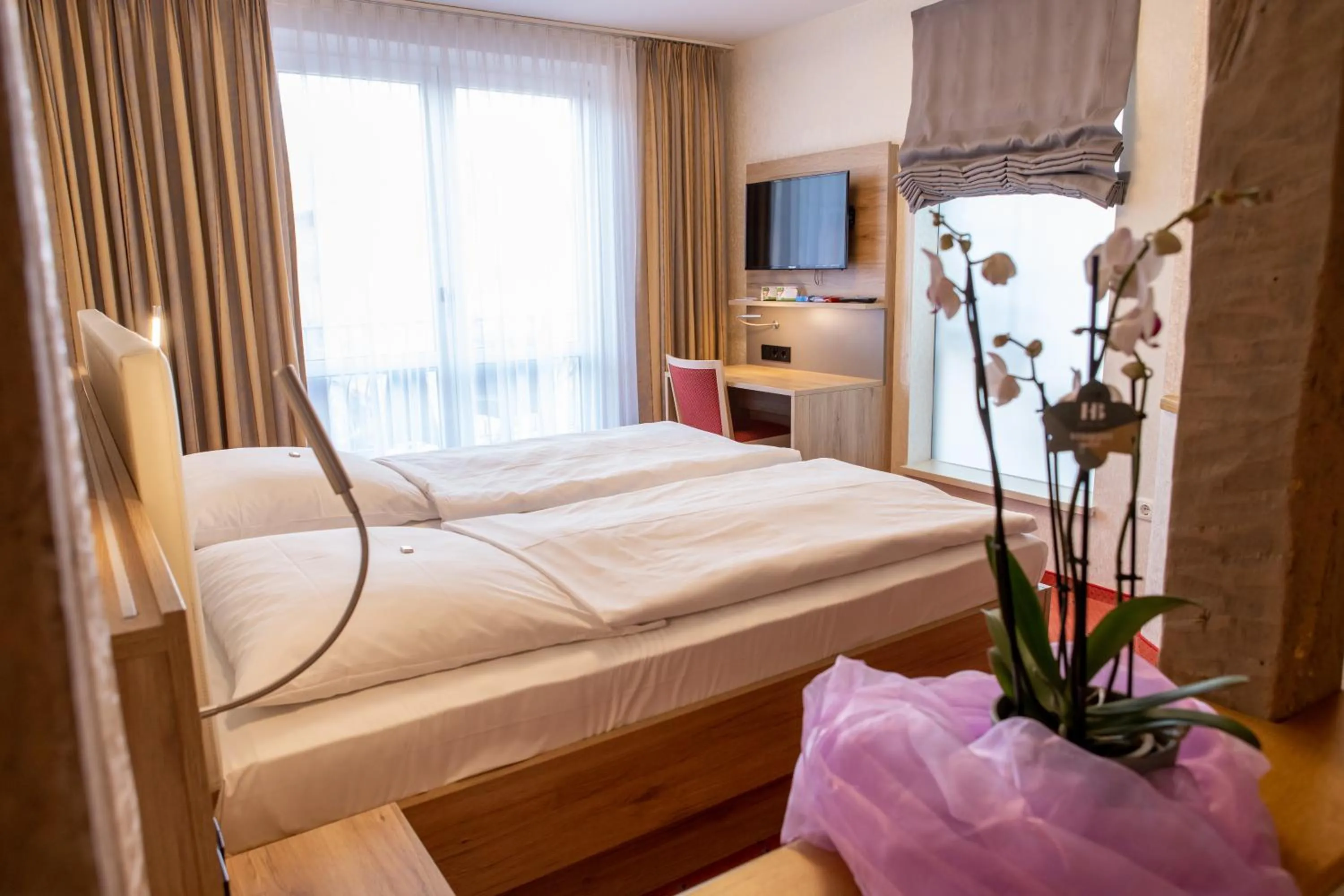 Bed in Flair Hotel Deutsches Haus