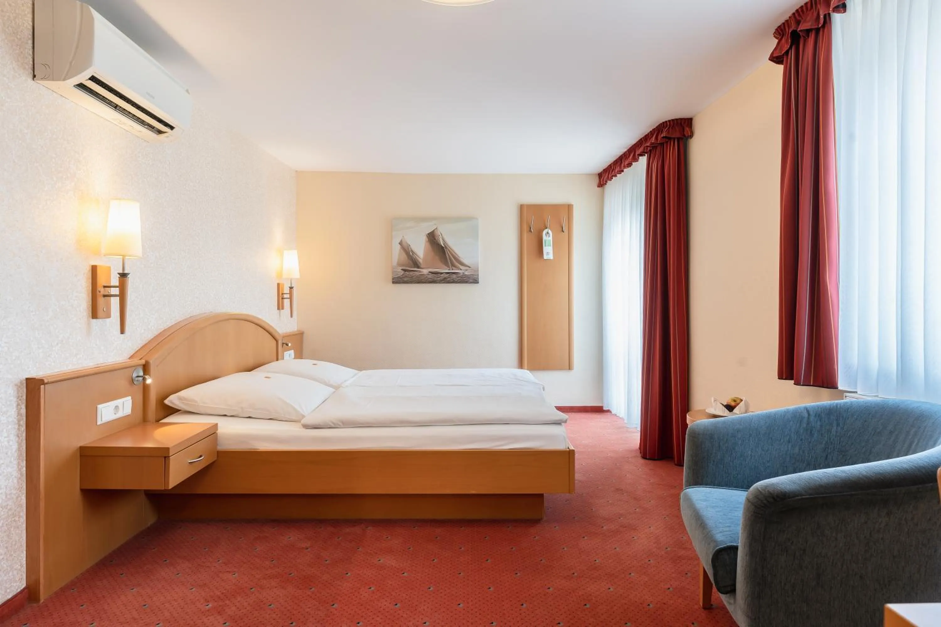 Bed in Flair Hotel Deutsches Haus