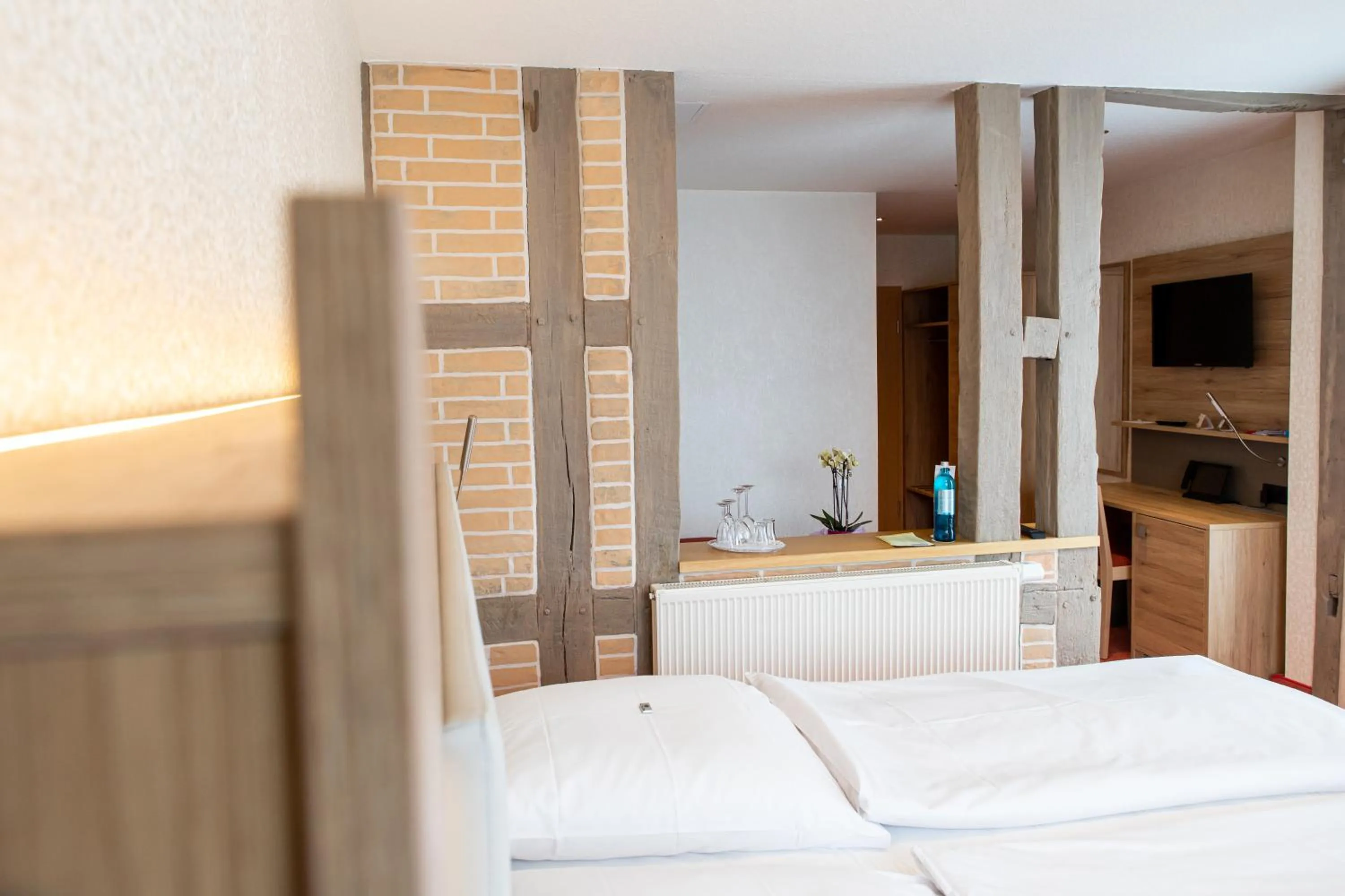 Bed in Flair Hotel Deutsches Haus