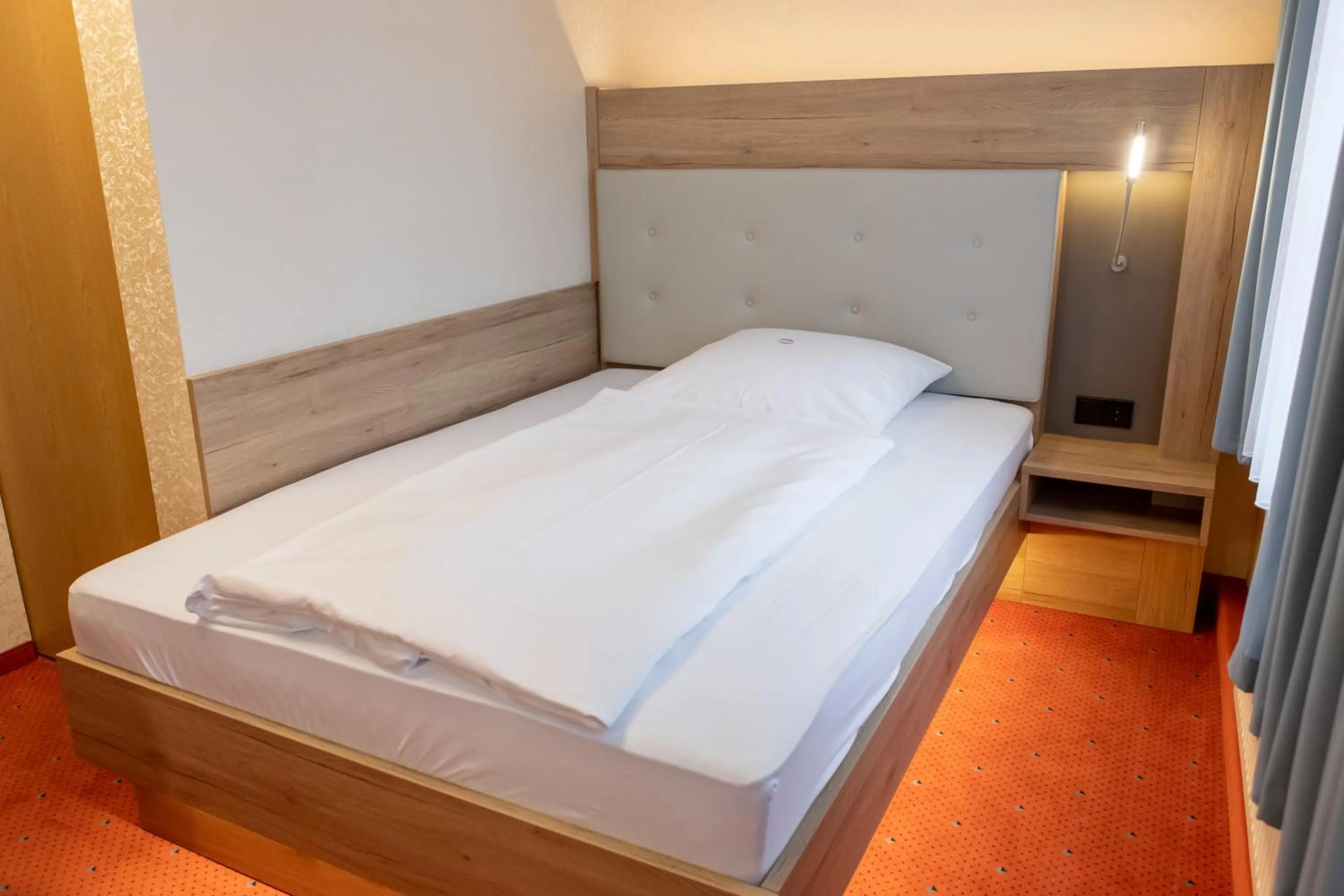 Bed in Flair Hotel Deutsches Haus