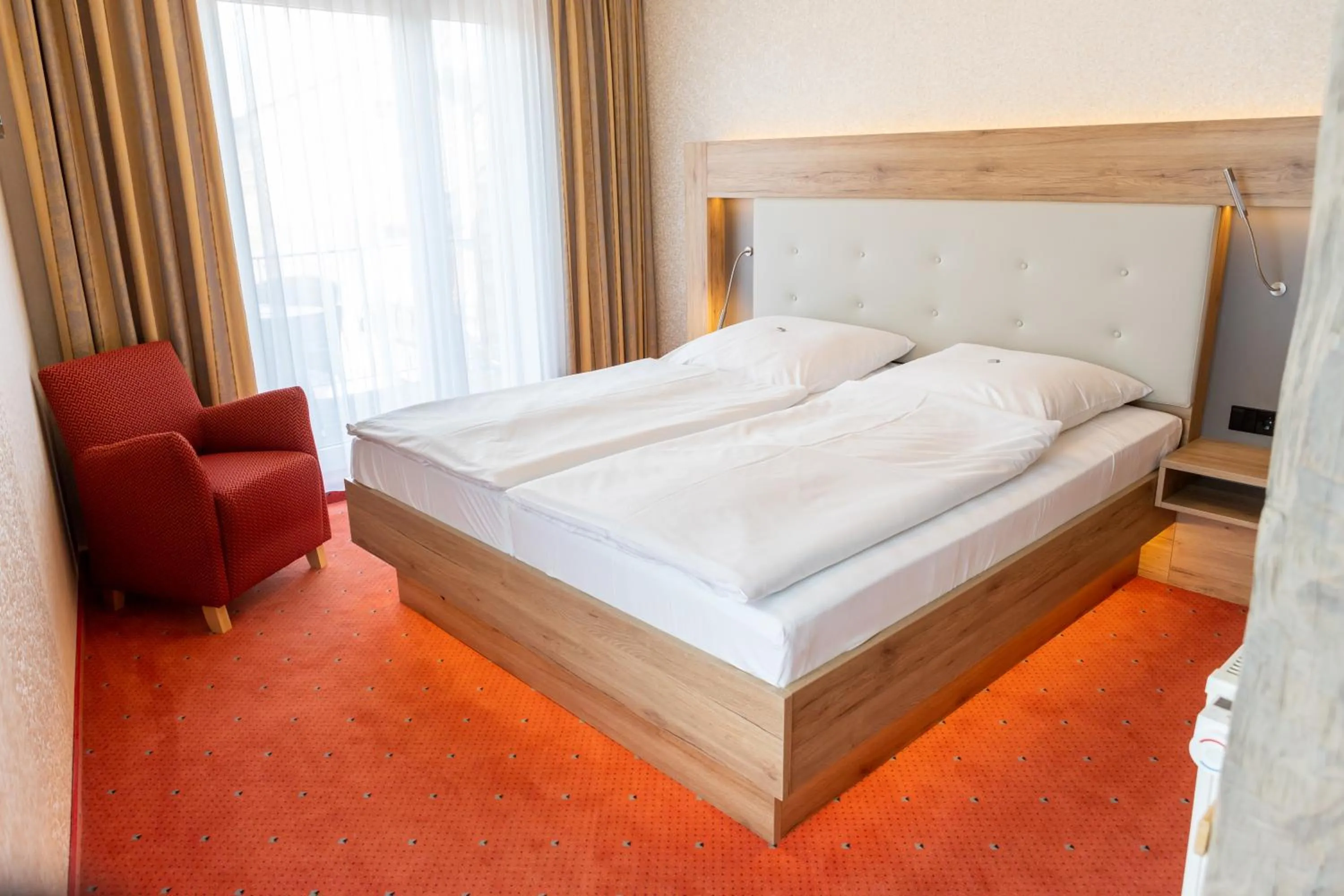Bed in Flair Hotel Deutsches Haus