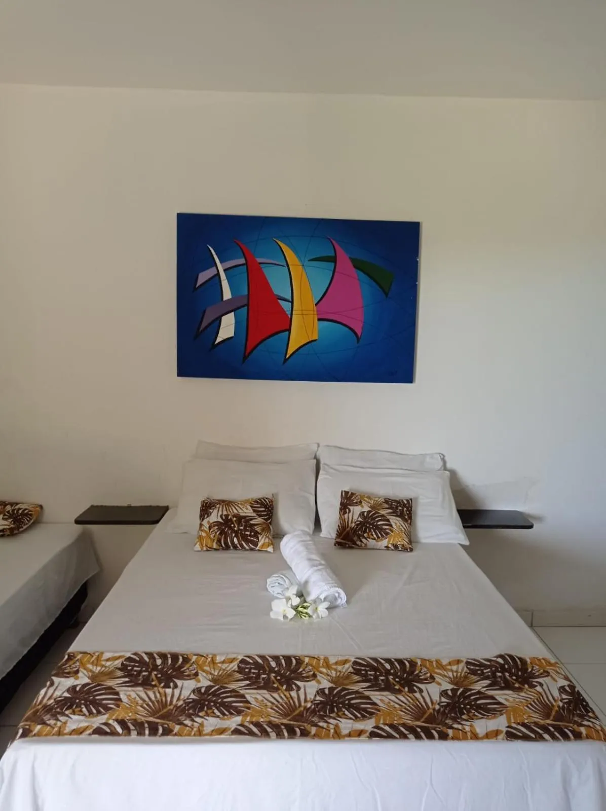 Bed in Pousada Portal dos Coqueirais