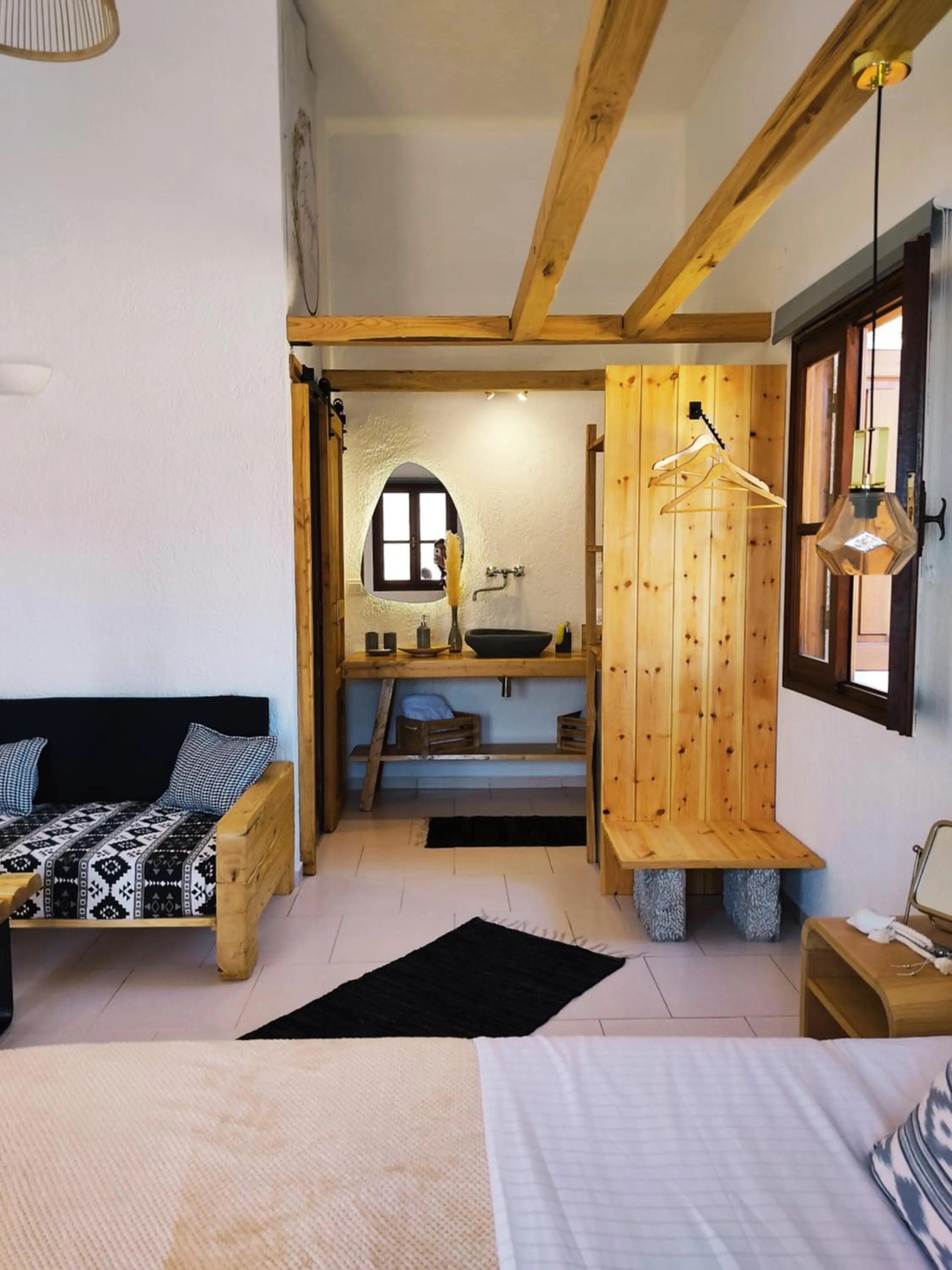 Seating area, Bed in Spongia Apartments Kalymnos