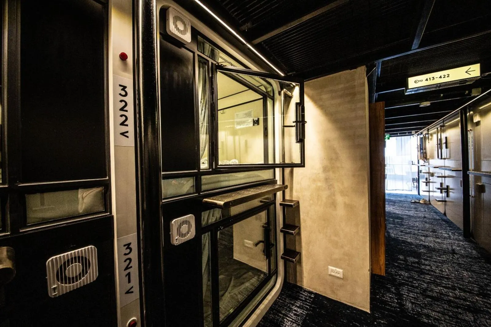 bunk bed in The O Pod Capsule Hotel