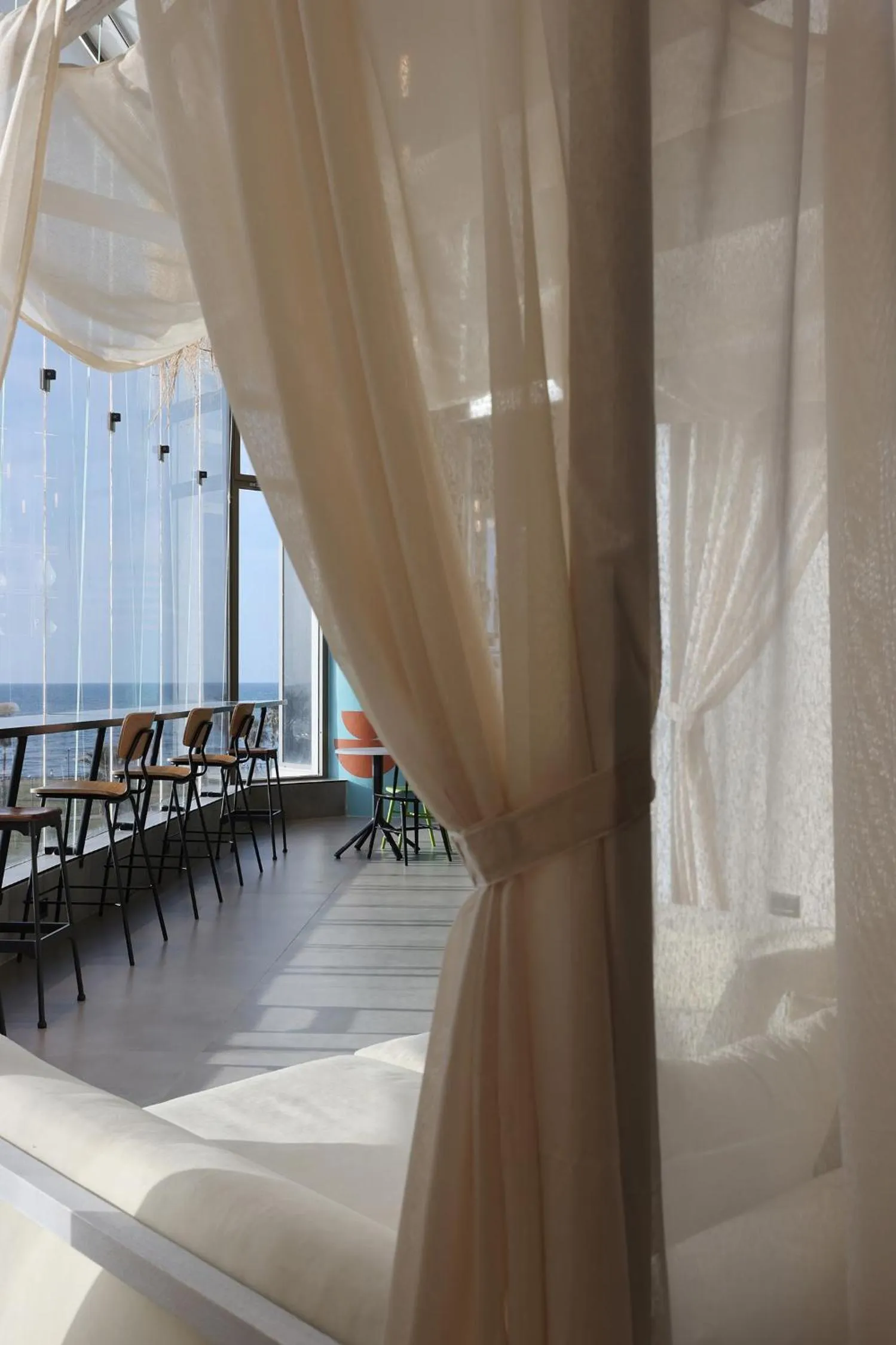Seating area in The O Pod Capsule Hotel