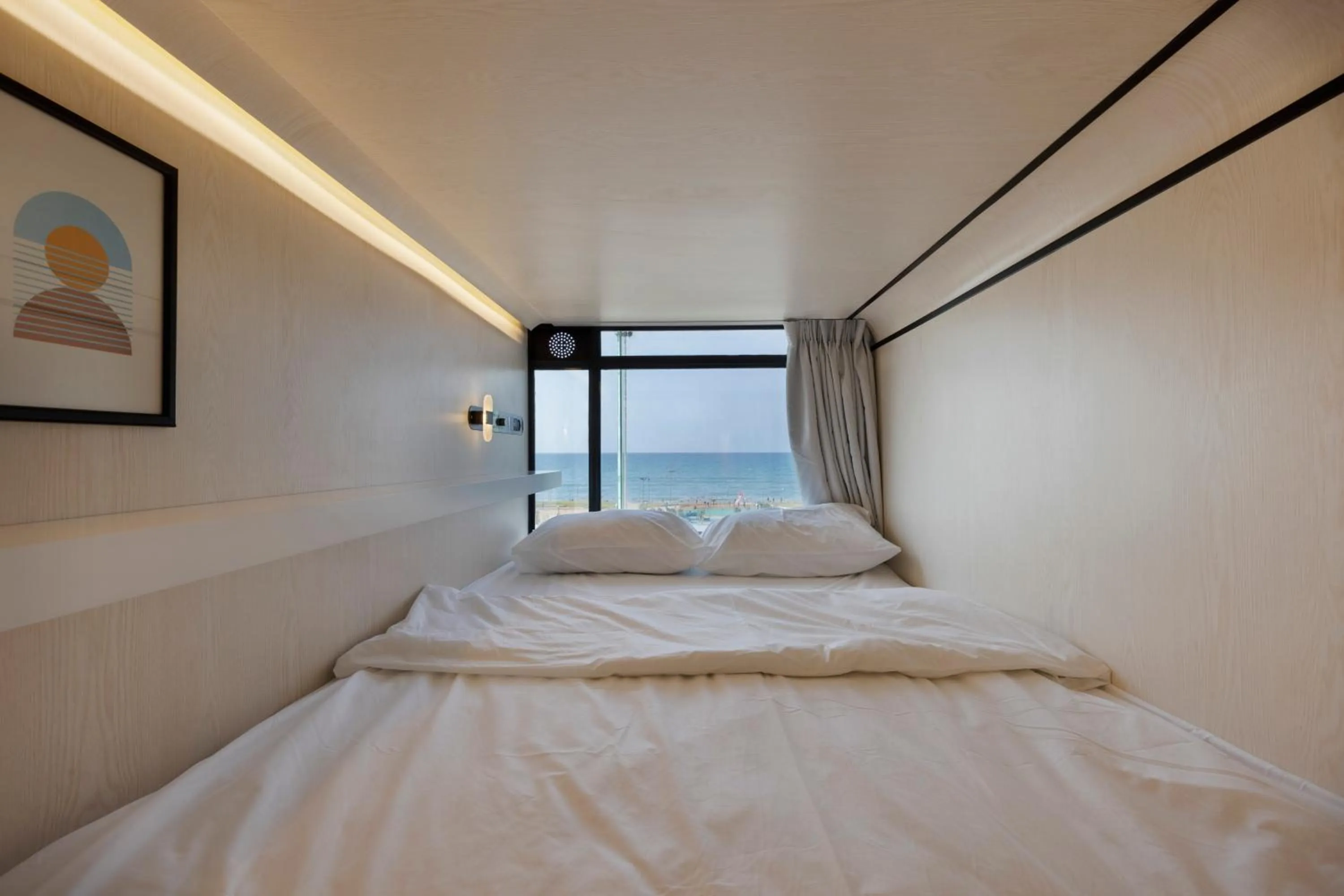 Bed in The O Pod Capsule Hotel