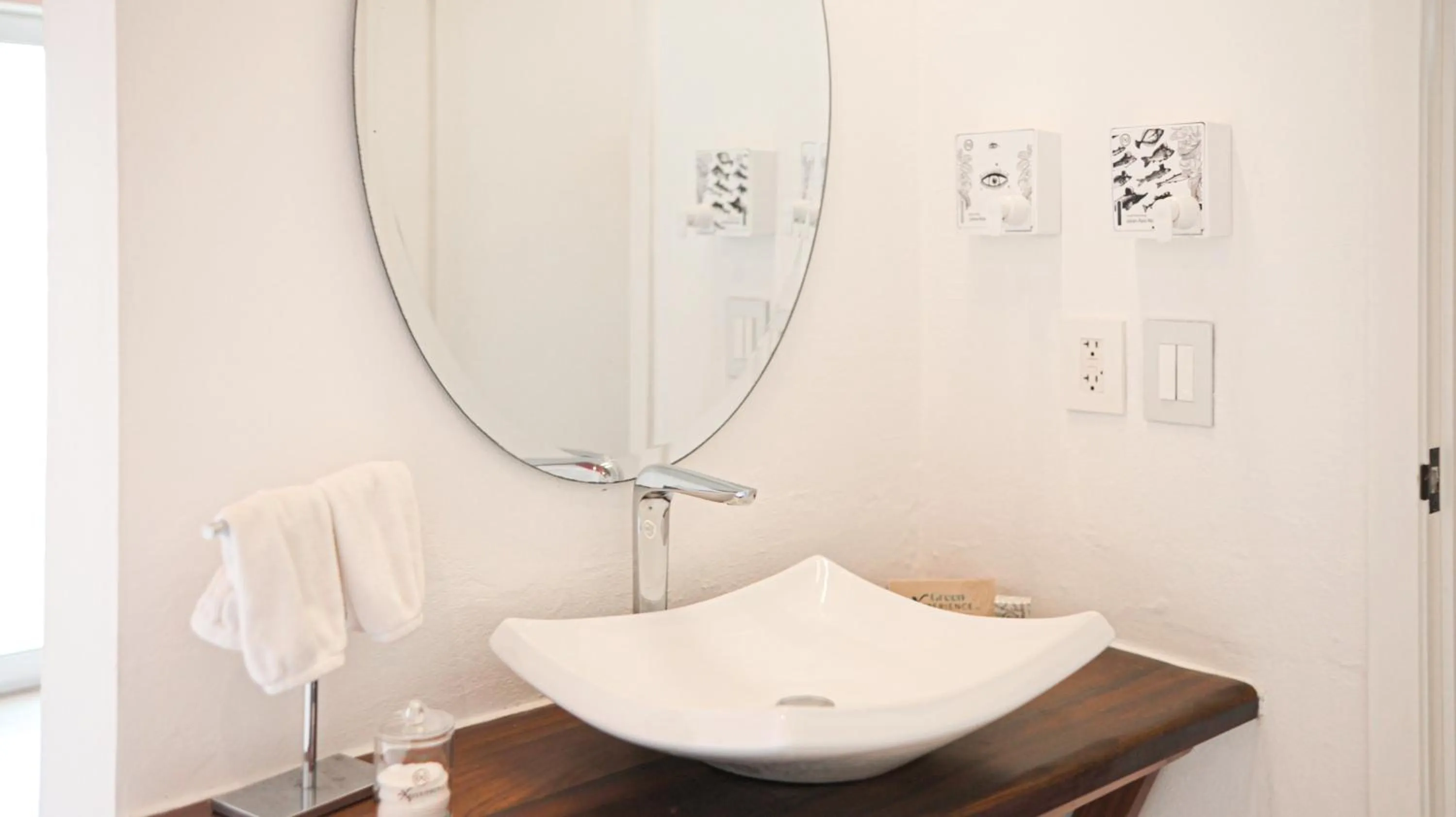 Bathroom in The Xperience by g