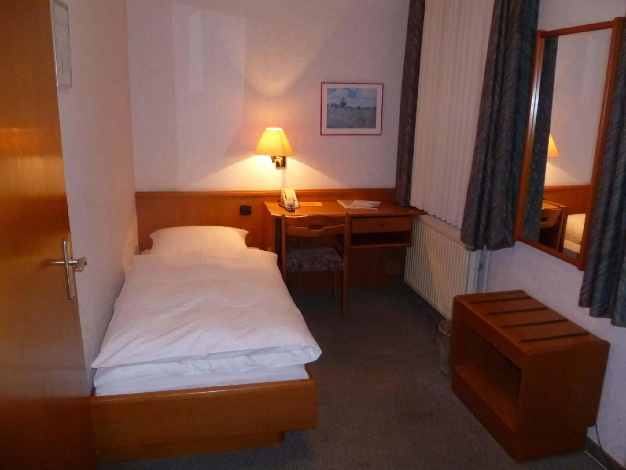 Photo of the whole room, Bed in Hotel Deutsche Eiche in Northeim