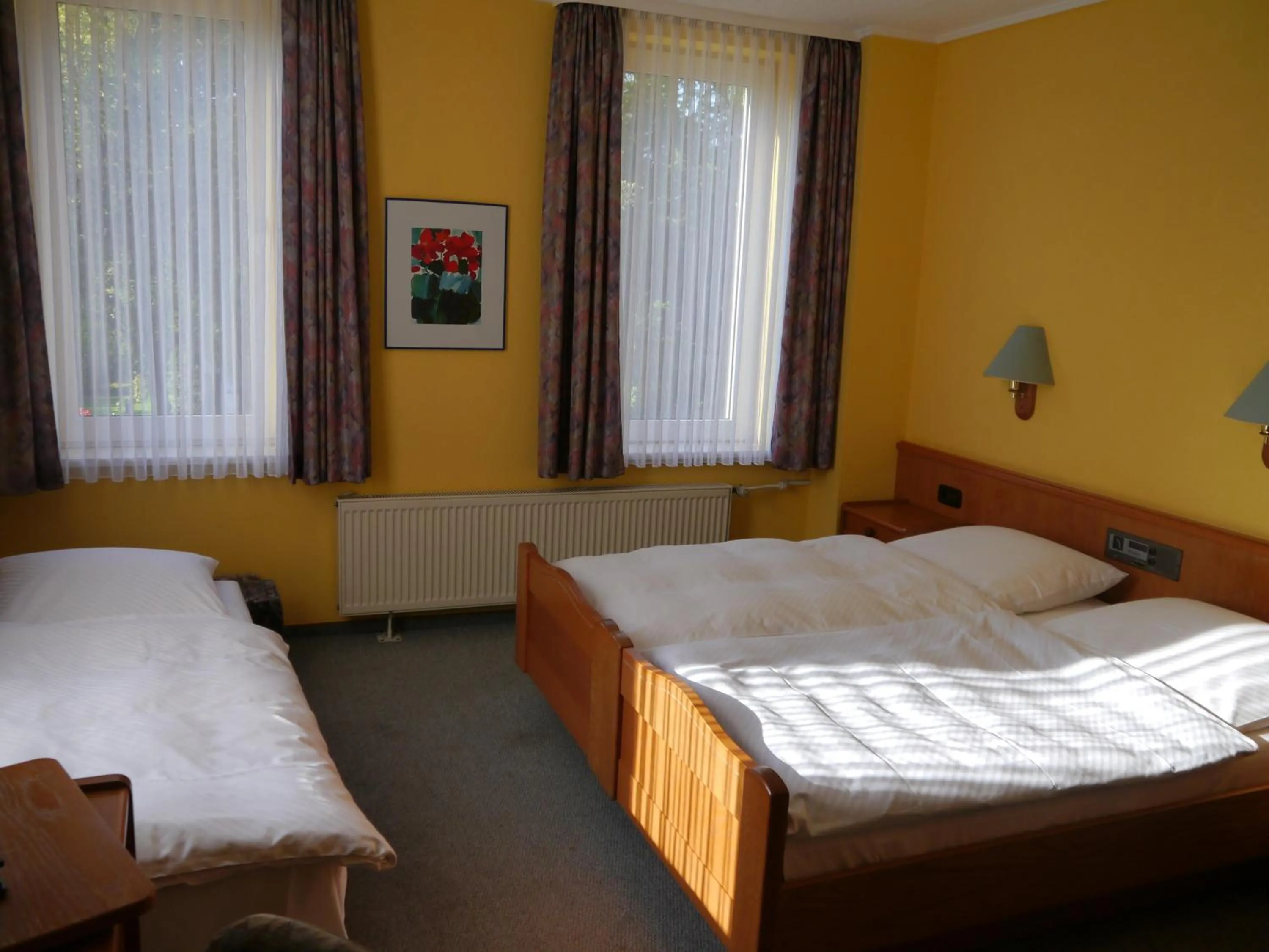 Photo of the whole room, Bed in Hotel Deutsche Eiche in Northeim