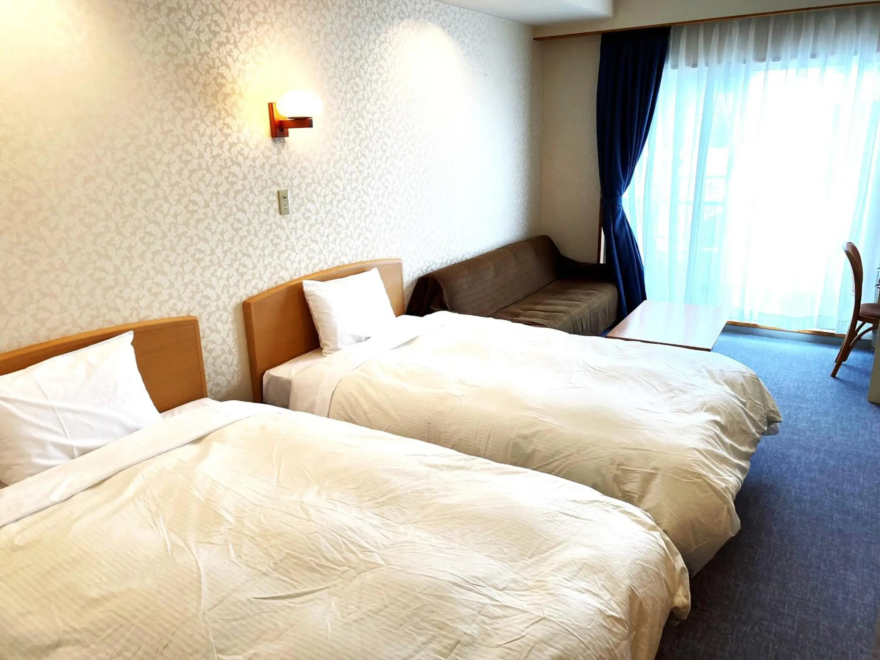 Bed in Hotel Kosaka Gold Palace Bed in Hotel Kosaka Gold Palace