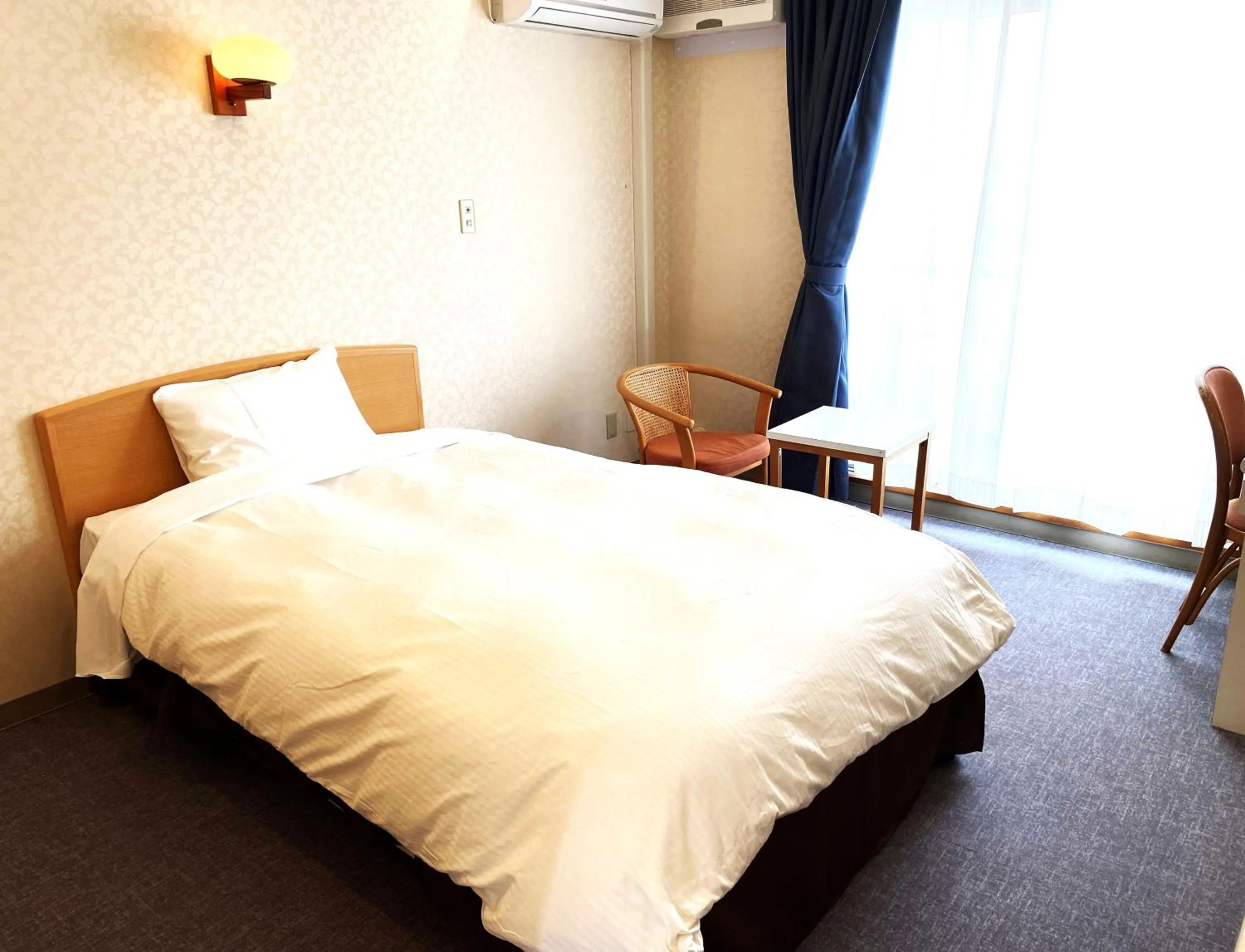 Bed in Hotel Kosaka Gold Palace