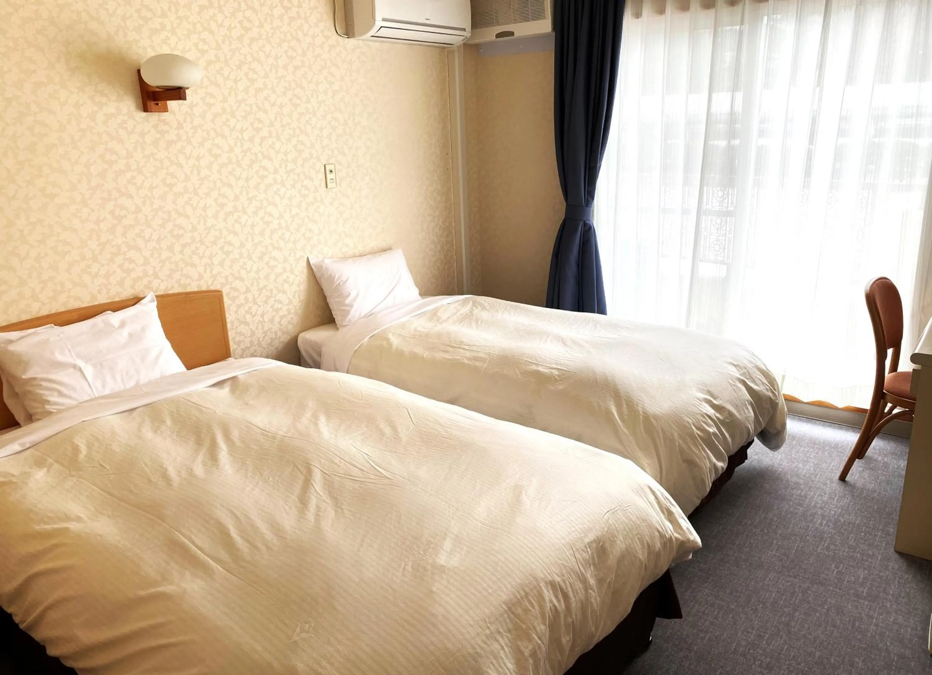 Bed in Hotel Kosaka Gold Palace