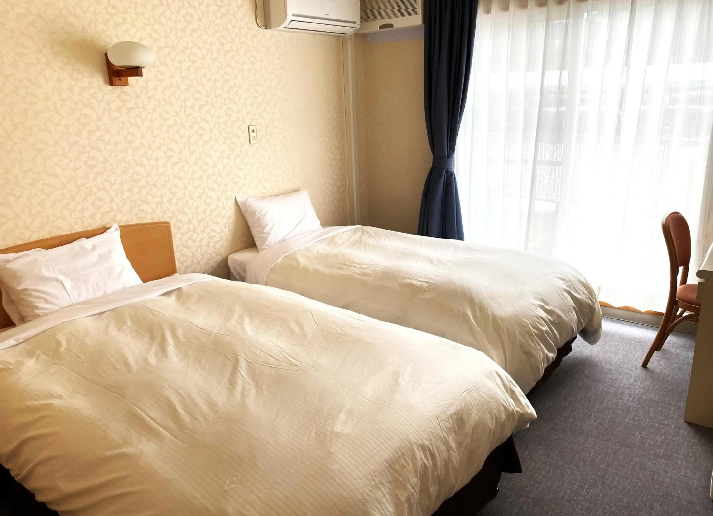 Bed in Hotel Kosaka Gold Palace Bed in Hotel Kosaka Gold Palace