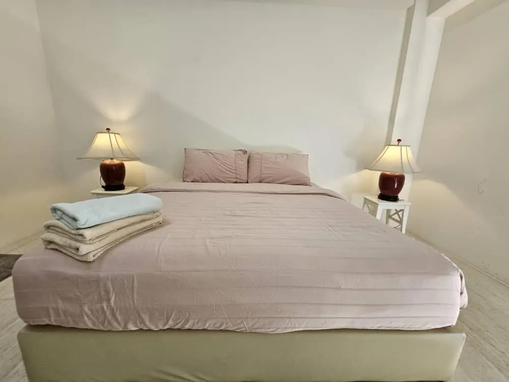 Bed in By The Sea Cozy Beachfront Home, Batu Ferringhi